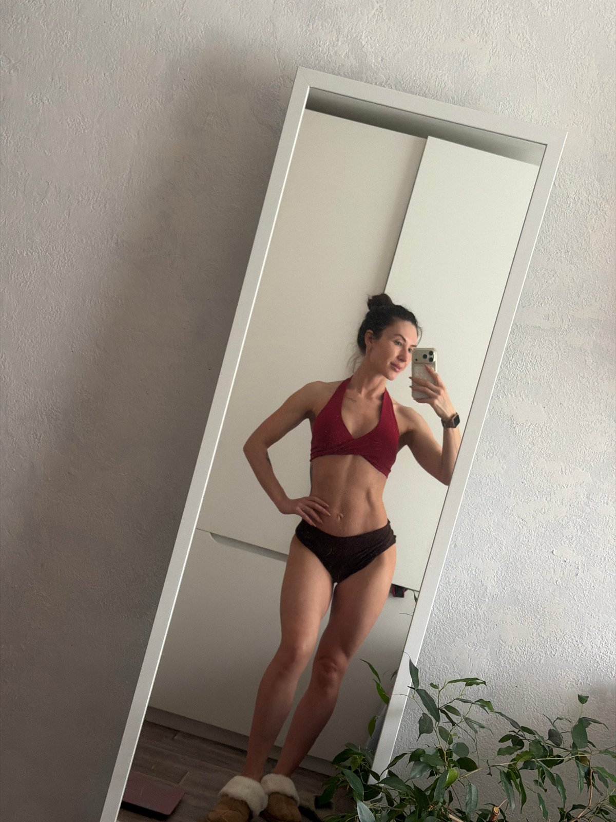 Woman takes mirror selfies in Perm indoor setting