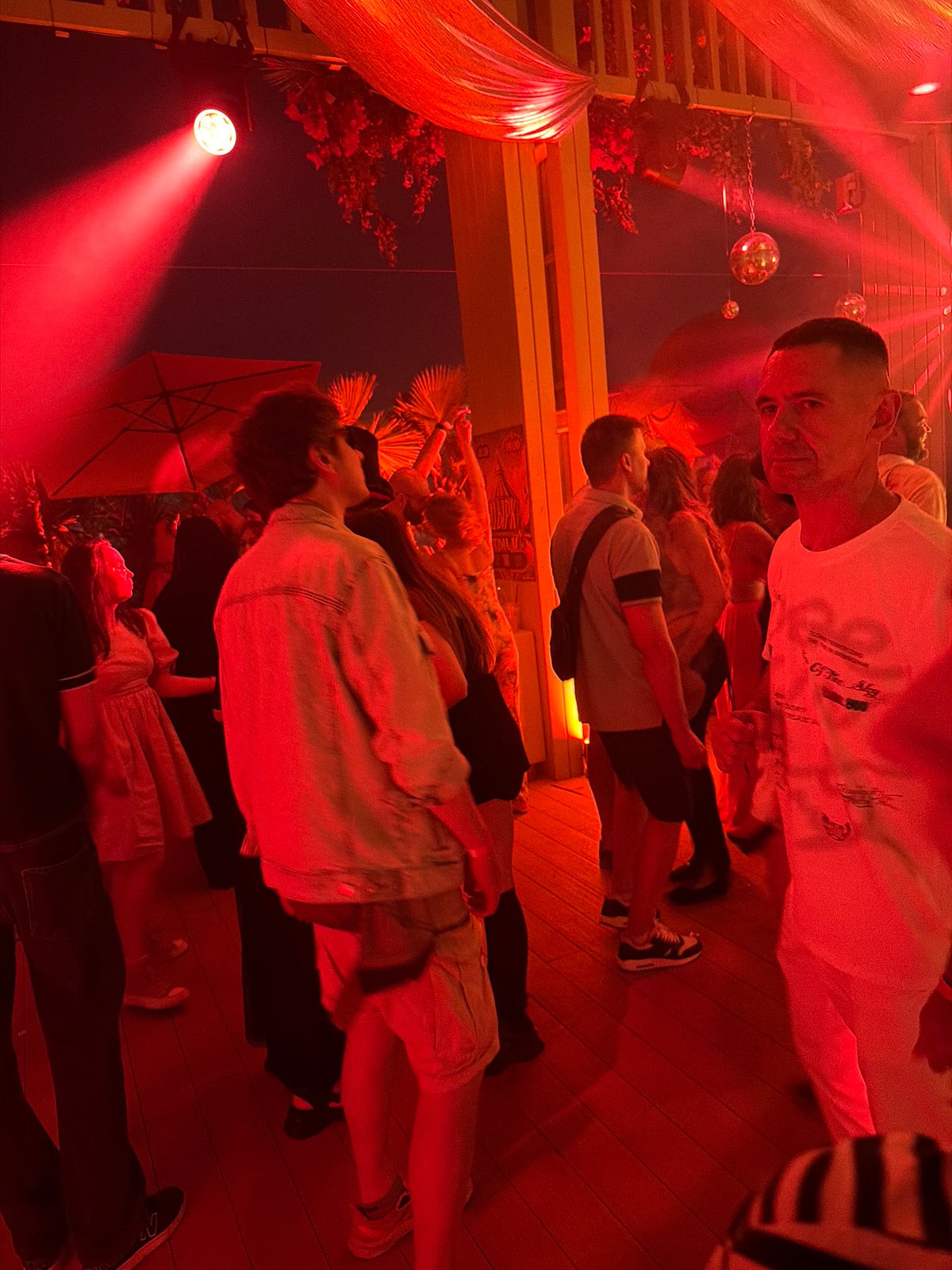 Red-lit outdoor gathering draws a crowd in Moscow