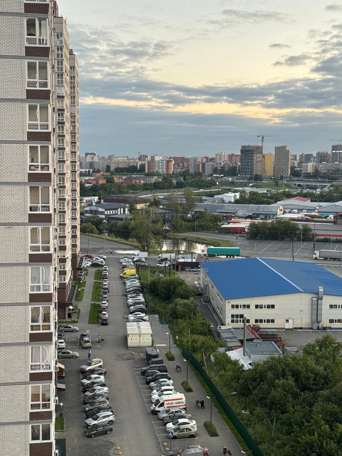 Tyumen skyline at sunset, construction and residential mix