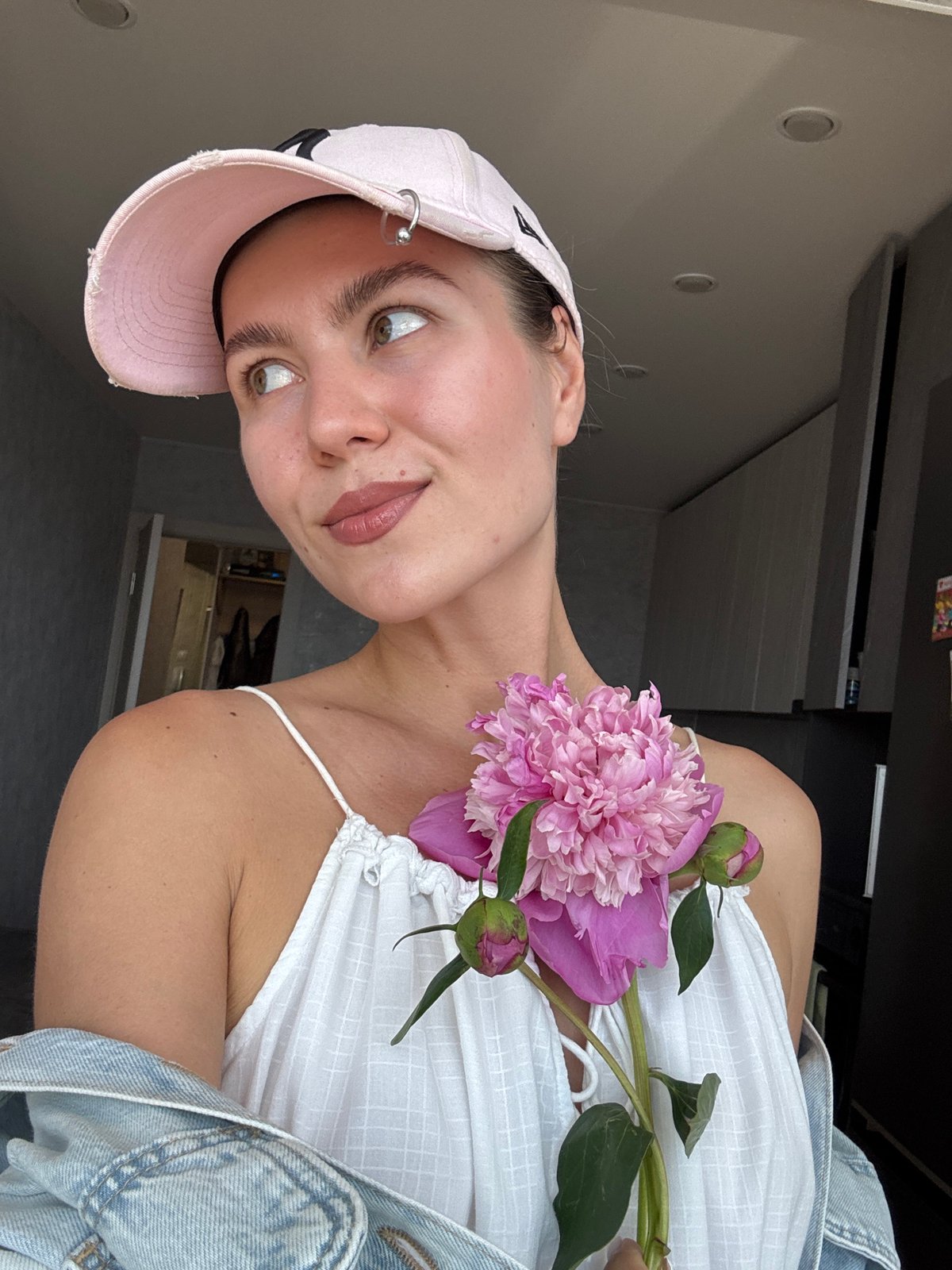 Morning photo session features woman, peony flowers, Bengal cat