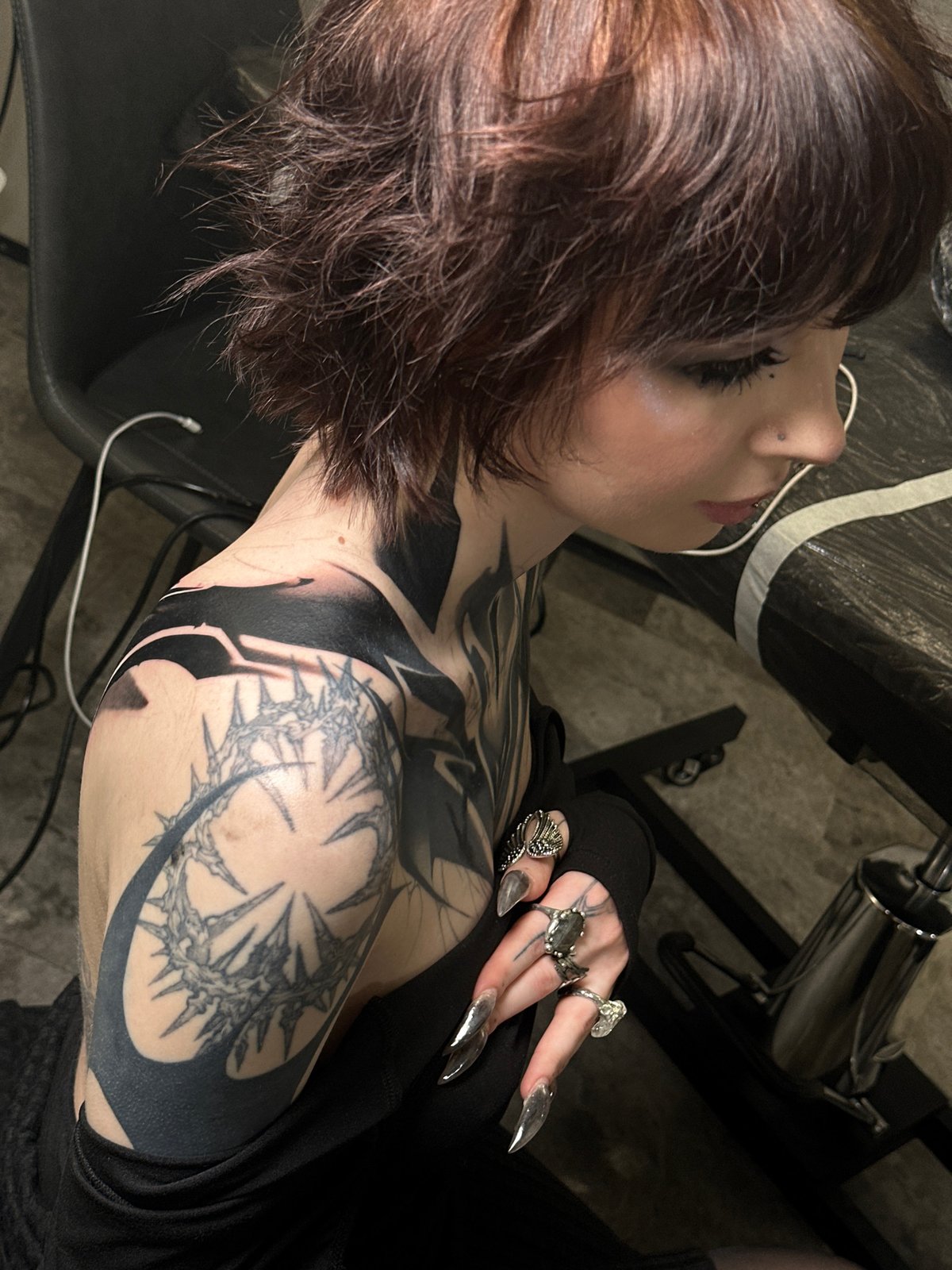 Tattoo session documented at Moscow studio