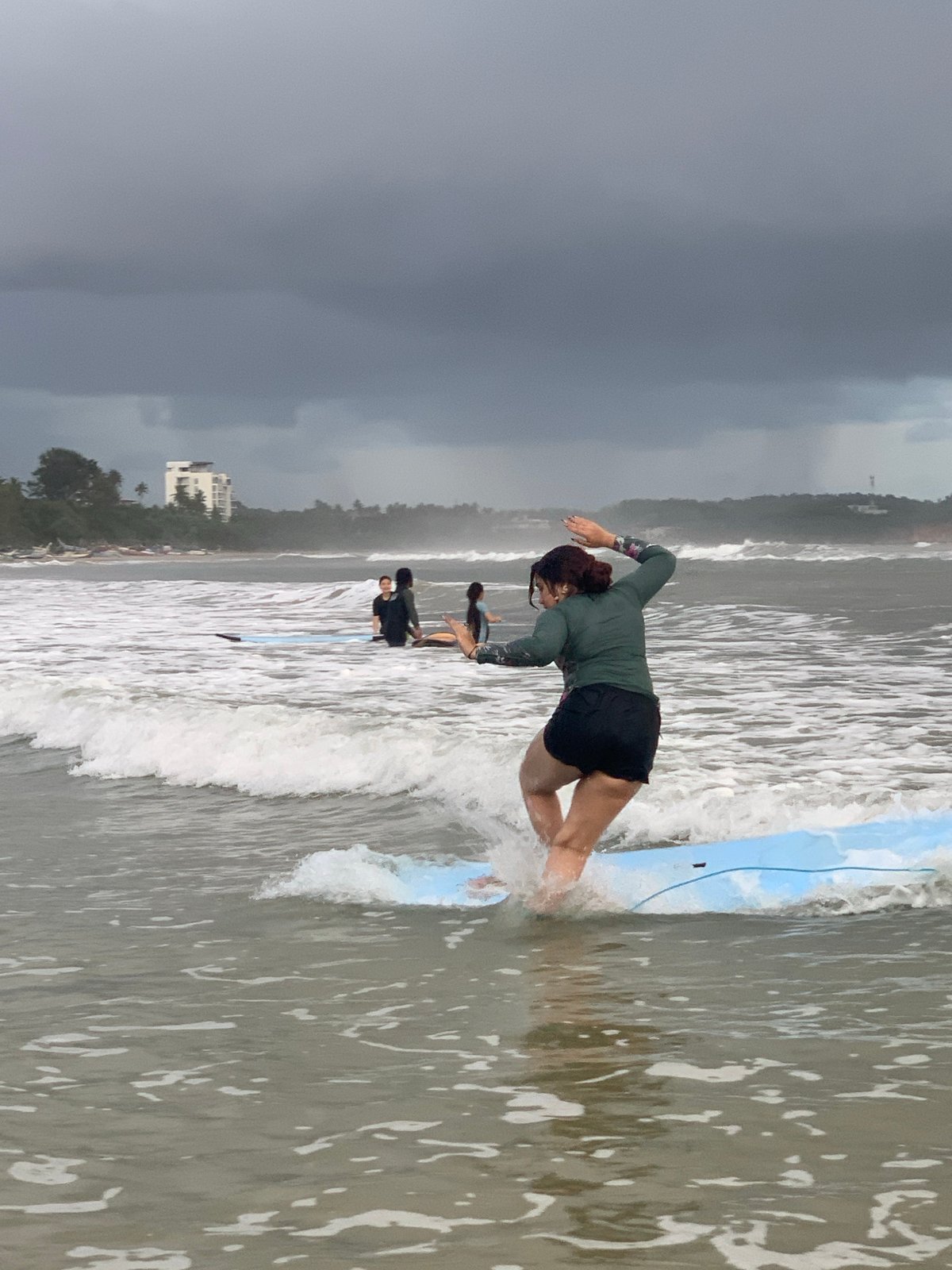 A full morning of surfing on Weligama's cloudy, rainbow-lit beach