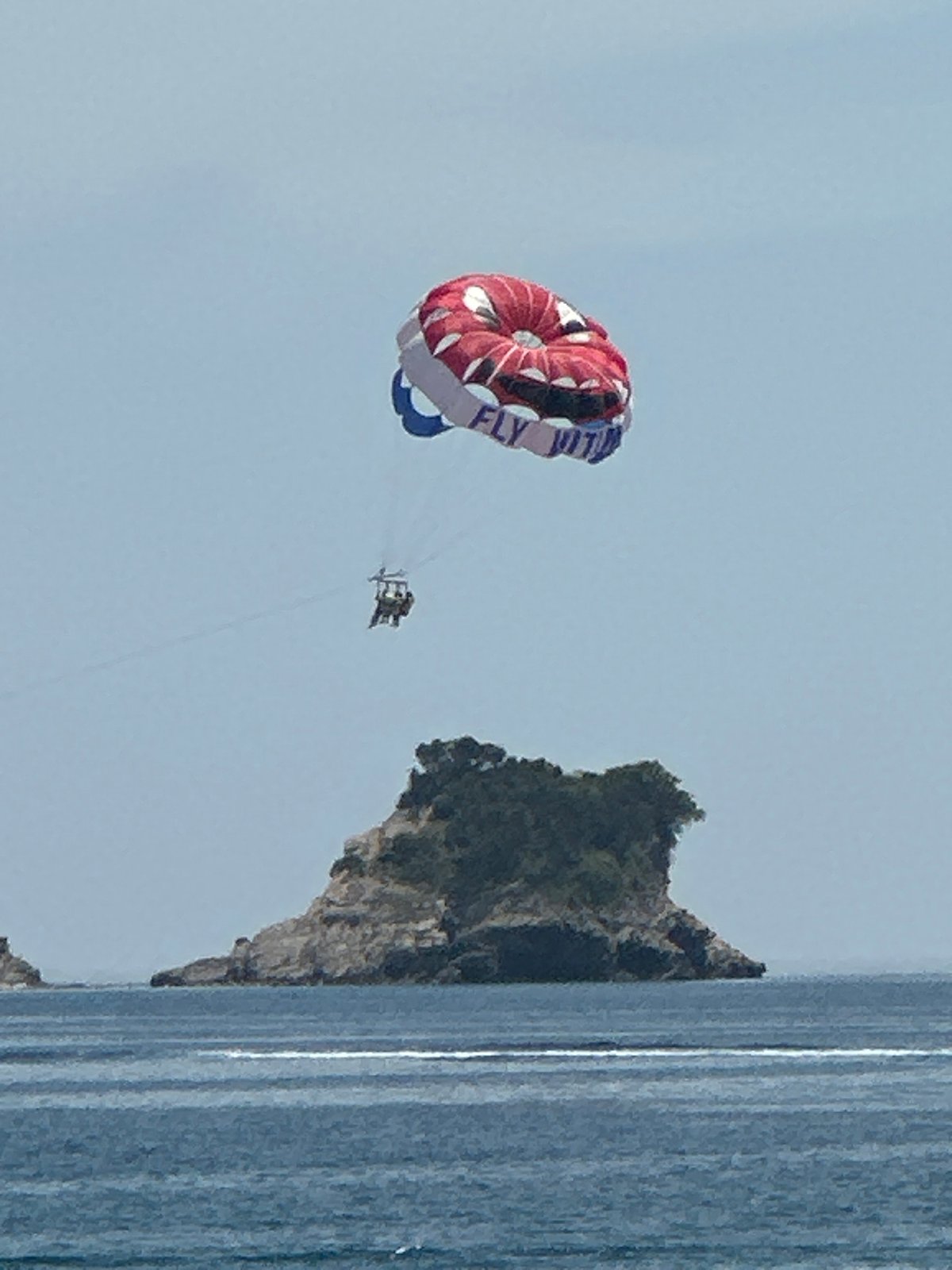 Parasailing activity observed off Budva coast during clear afternoon