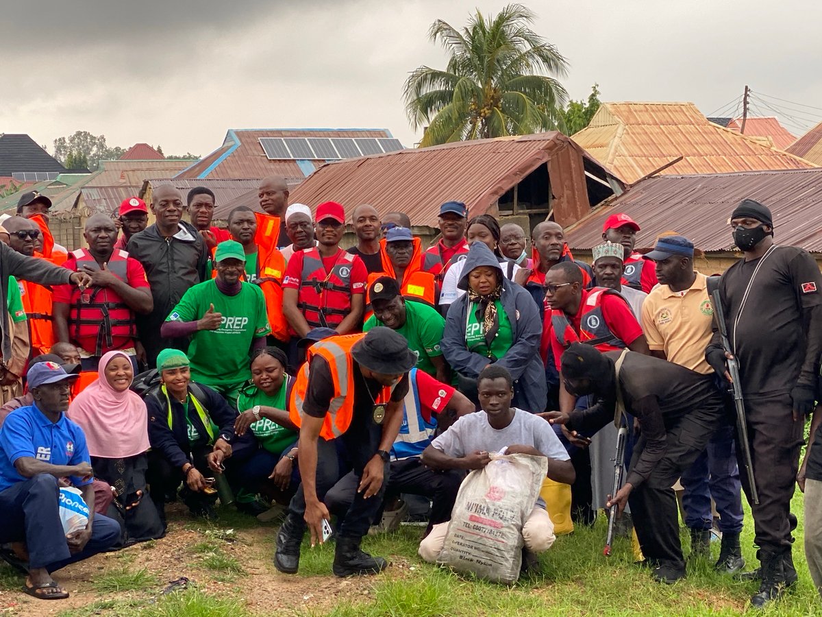 Armed and emergency personnel gather in Kawo, Nigeria