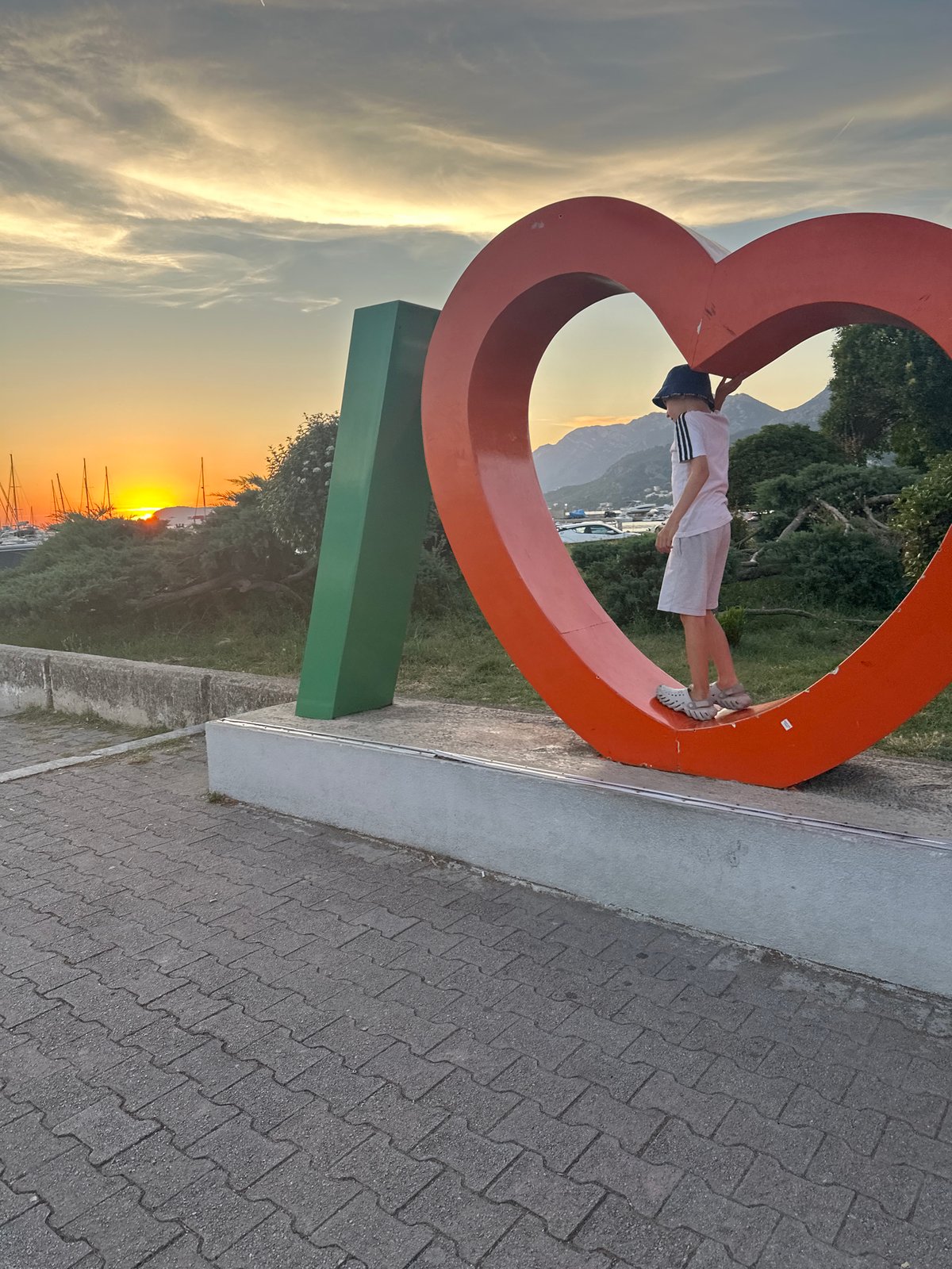 A summer day in Bar, Montenegro, beach to harbor at sunset