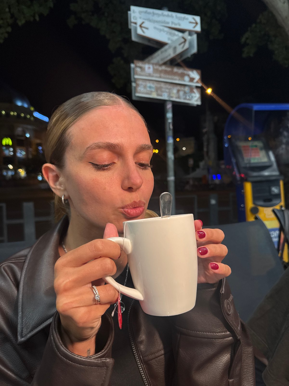 Late-night café moment on a Tbilisi street