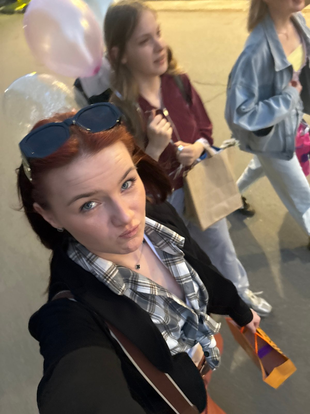 Selfie moment on a Saint Petersburg street at dusk