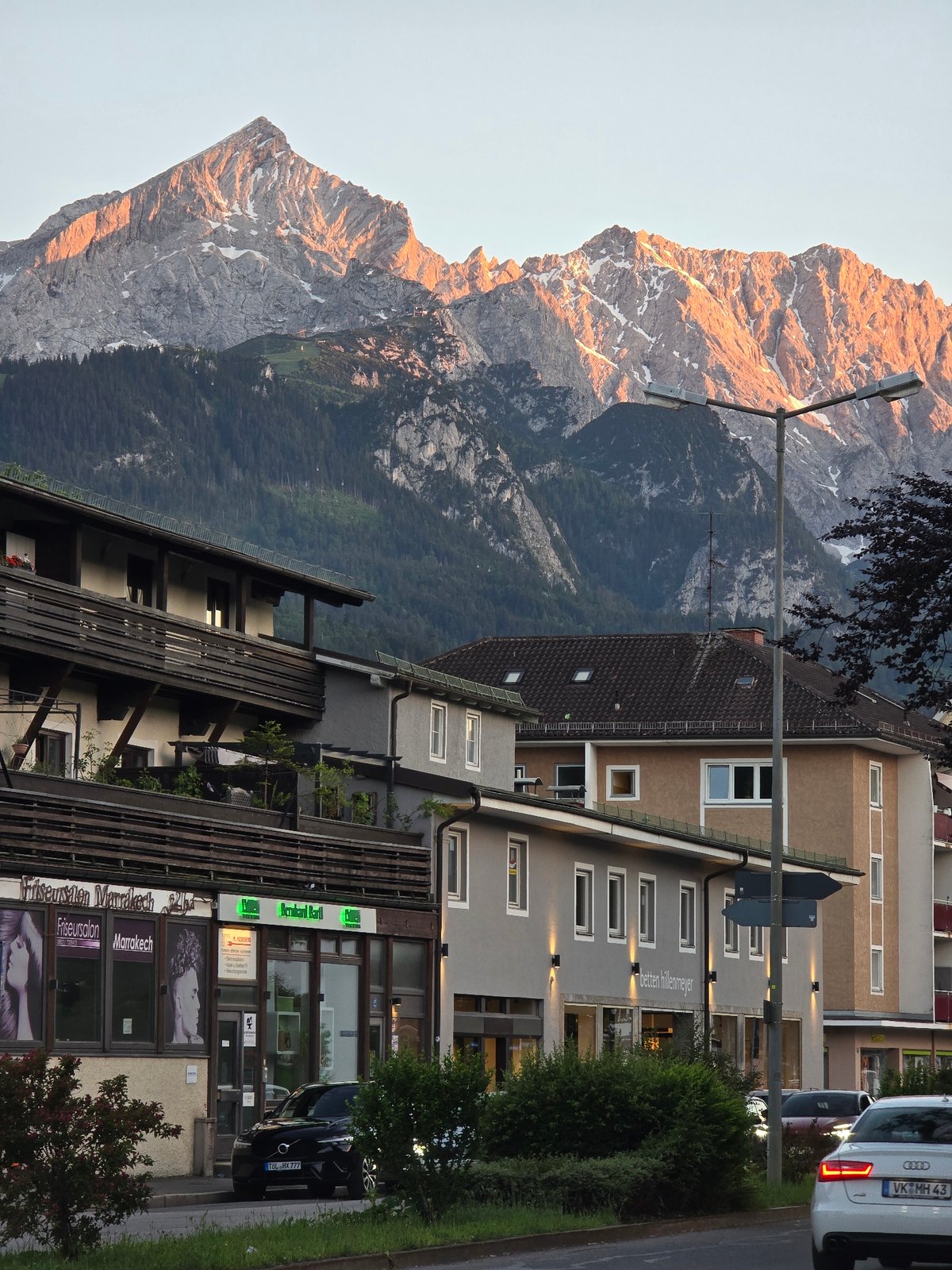 Golden hour views of Zugspitze and Bavarian streets