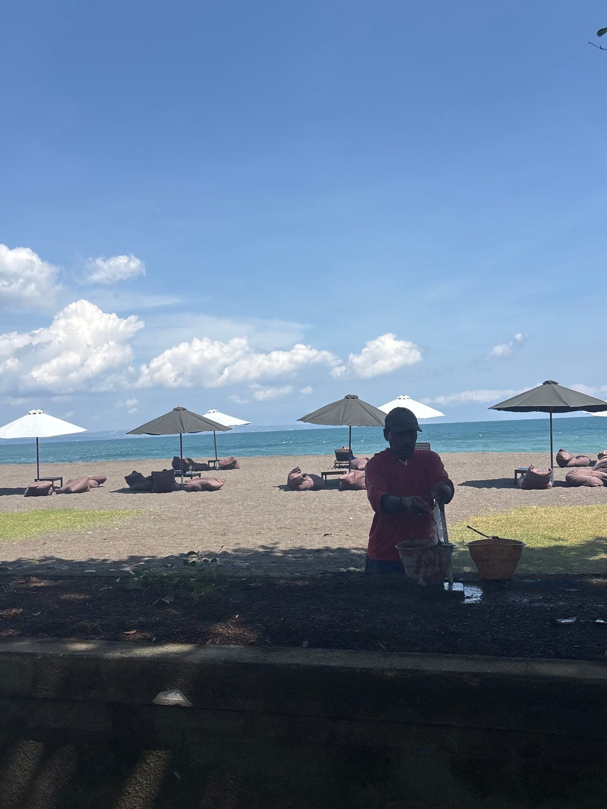 Beach scenes and traditional structures documented in Mengwi, Indonesia