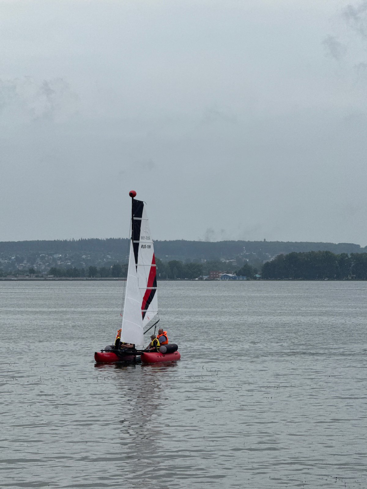 Sailing event on the Votkinsk Reservoir, overcast June morning