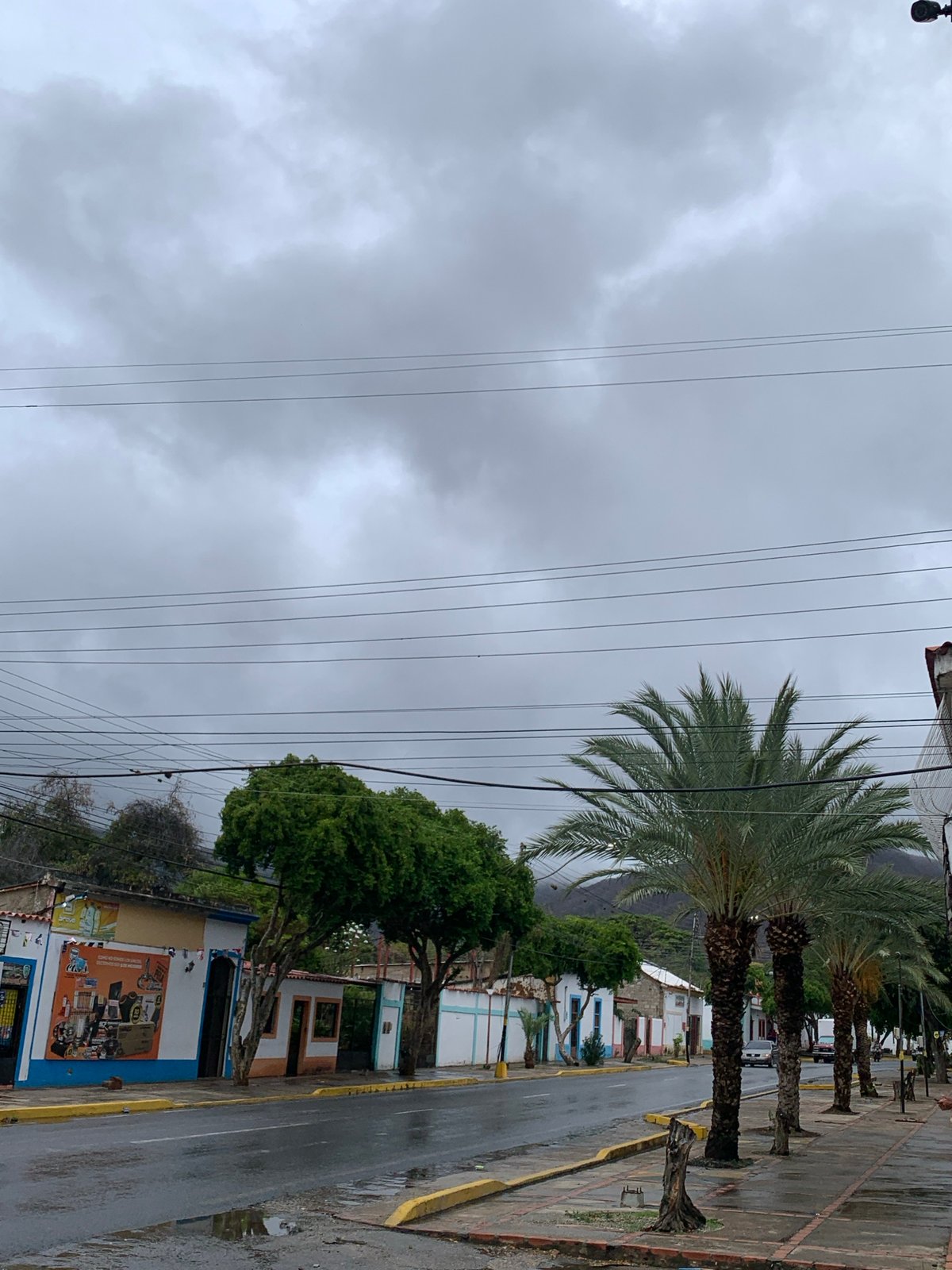 Post-rain evening scenes captured across Santa Ana, Venezuela neighborhoods