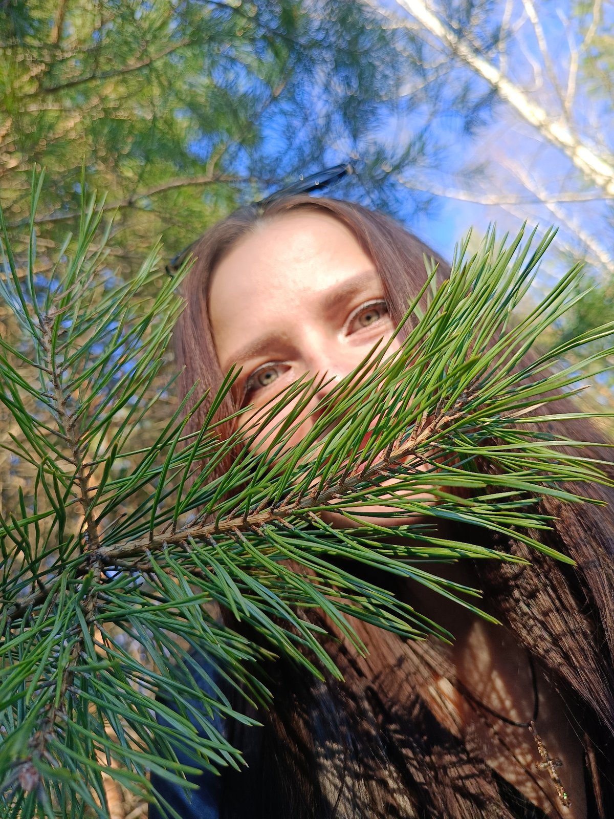 Woman and baby photographed in Chaikovsky forest during afternoon outing