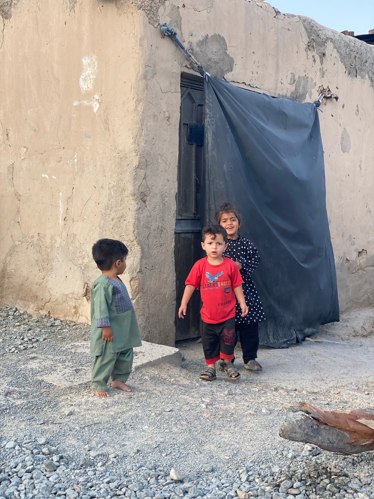 Street life and architecture across a Kandahar neighborhood