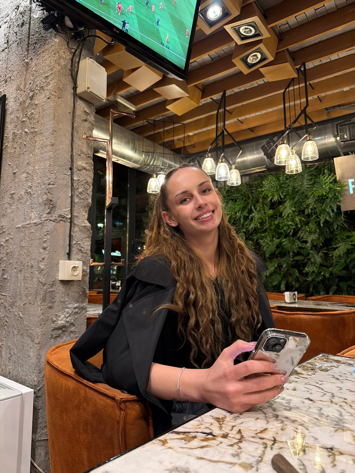 Evening social gathering documented at Sofia cafe-bar establishment
