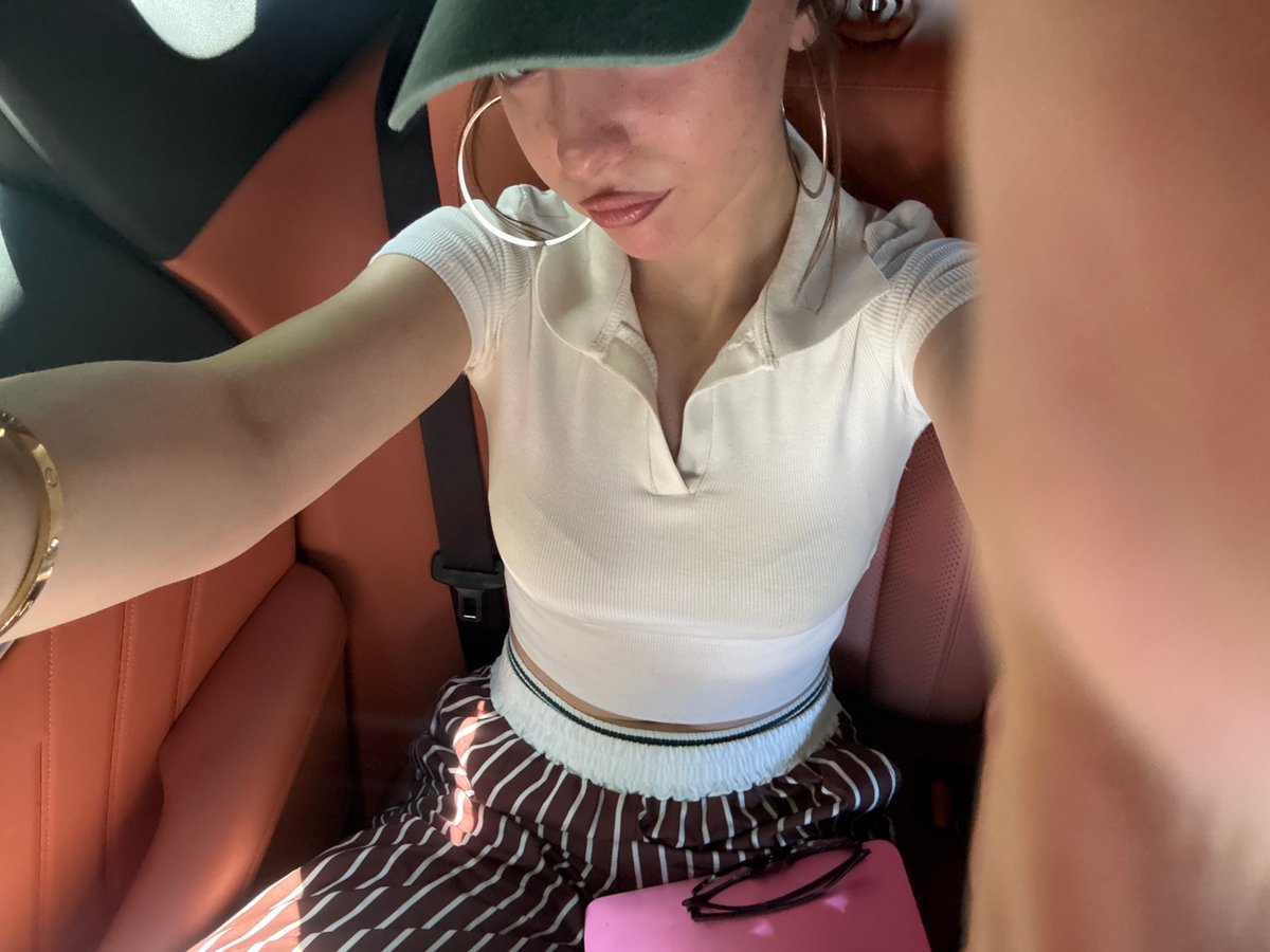 Passenger seat moments in a Yerevan car, June morning
