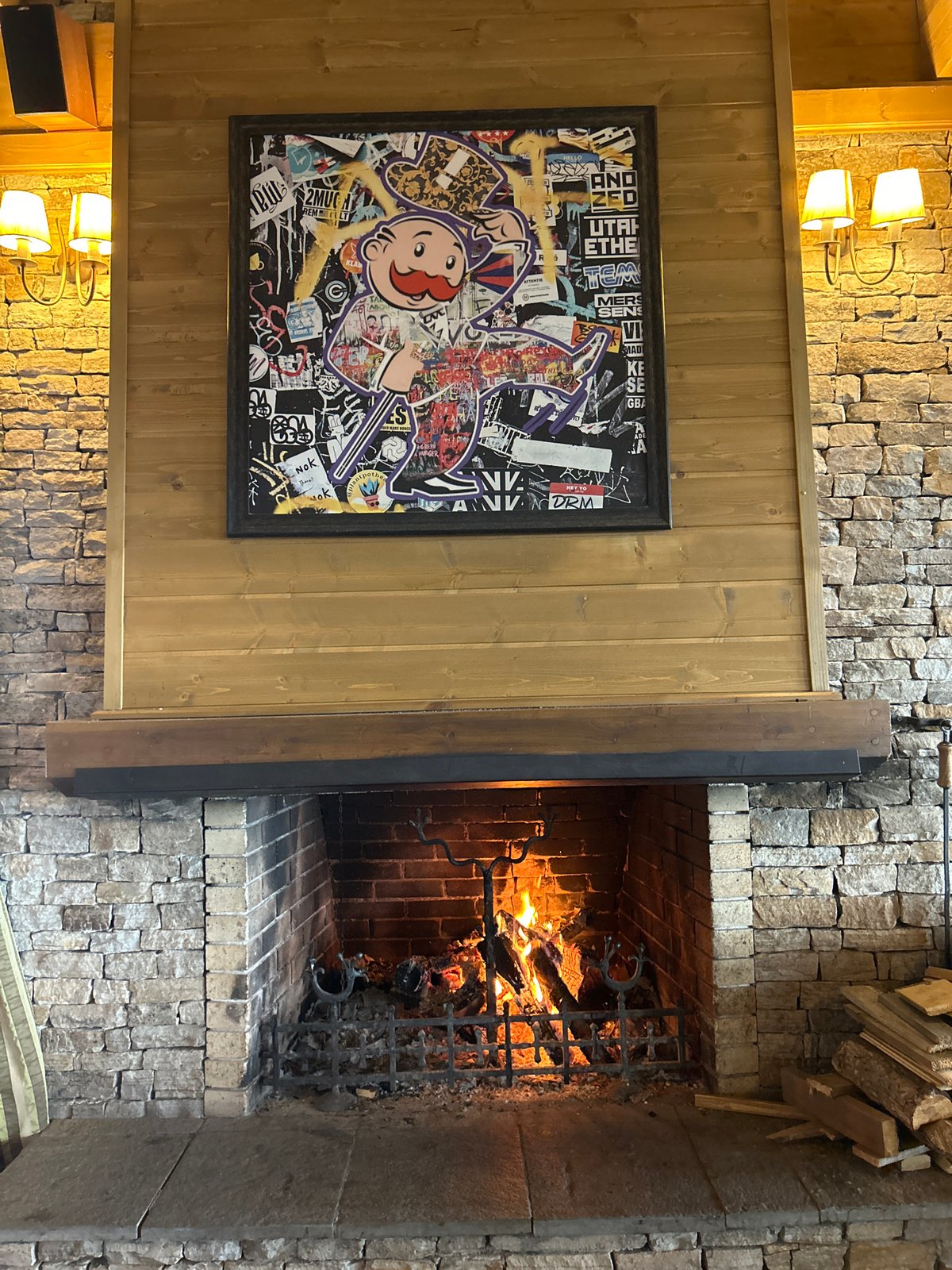 Indoor scene with alcohol display, fireplace documented in Razlog