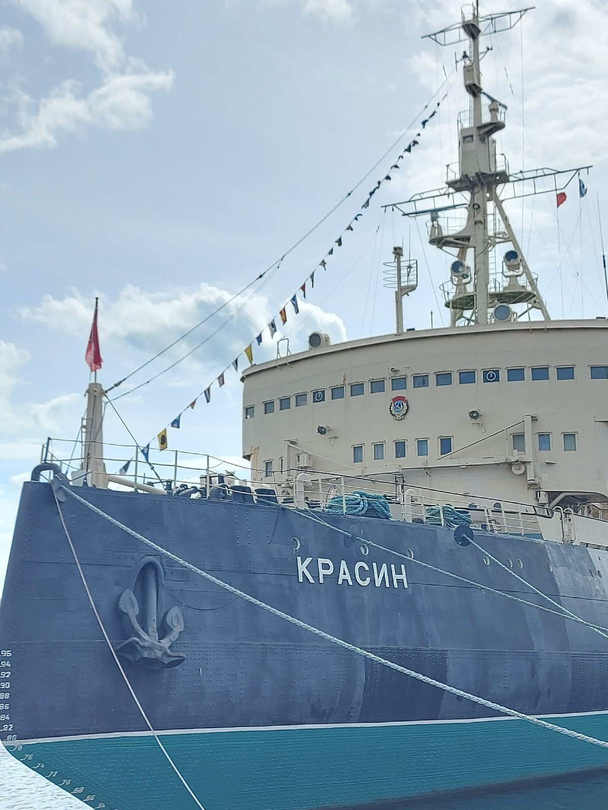 Routine sightseeing moments captured around Saint Petersburg's Krasin museum ship
