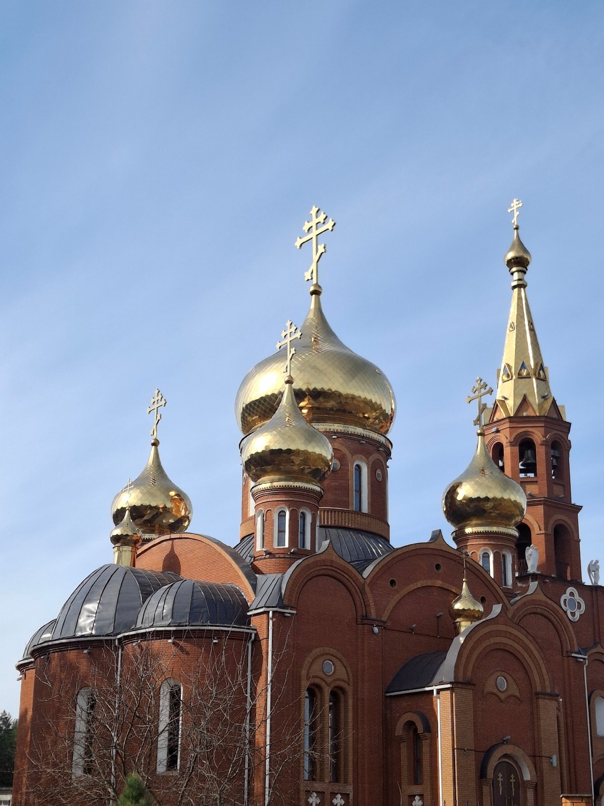 Orthodox cathedral with golden domes observed in Chaikovsky, Russia