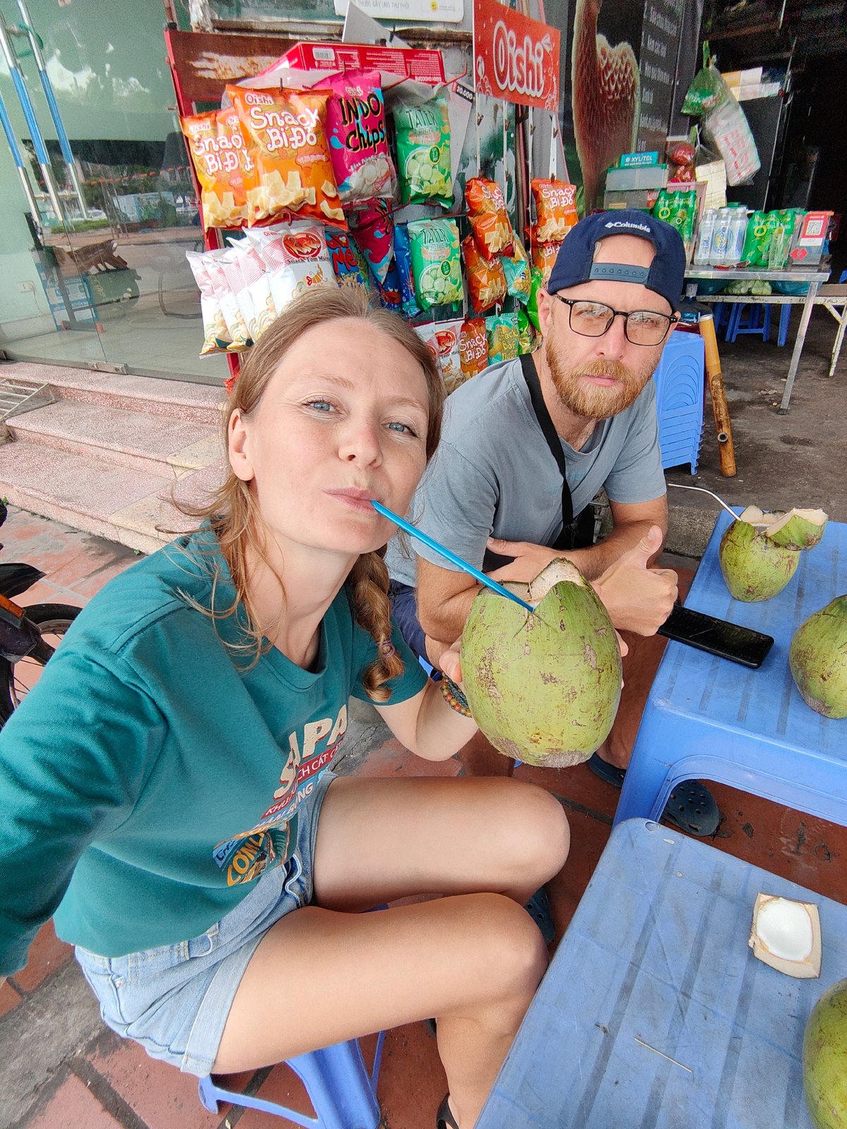 Early morning coconut vendors serve customers in Vietnam ward