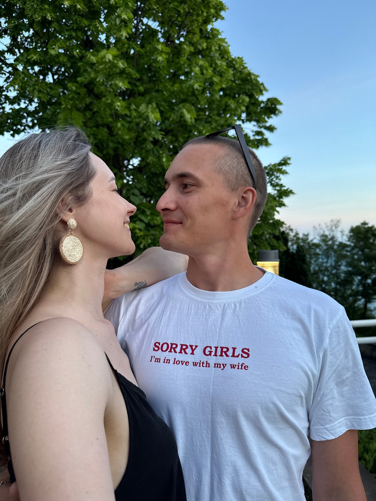 Couple embraces in outdoor portrait in Nebug, Russia