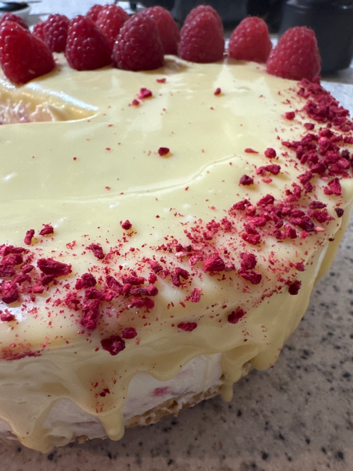 Raspberry cheesecake documented during evening consumption in Desborough