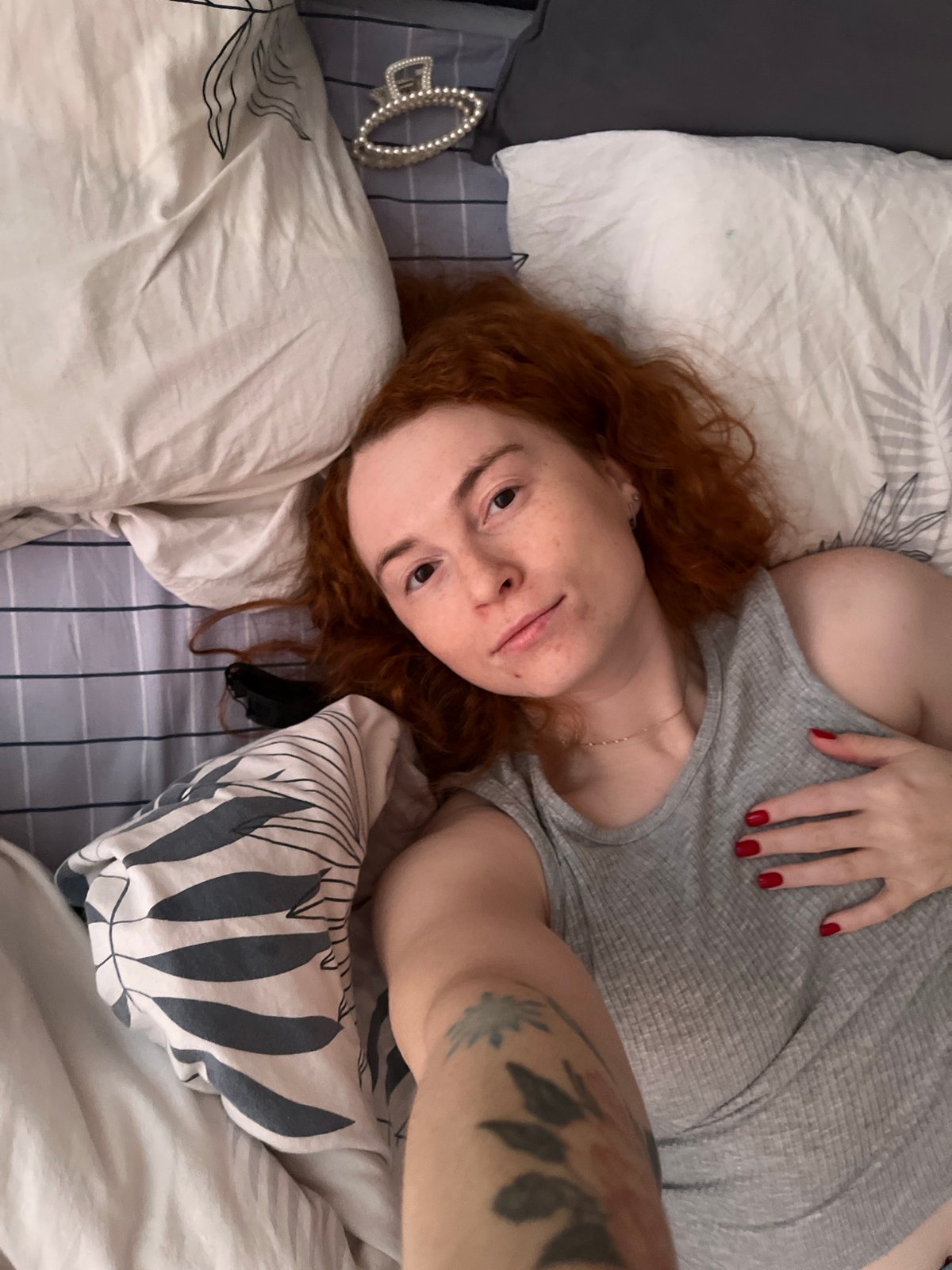 Woman photographed resting indoors in Chaikovsky, Russia morning session