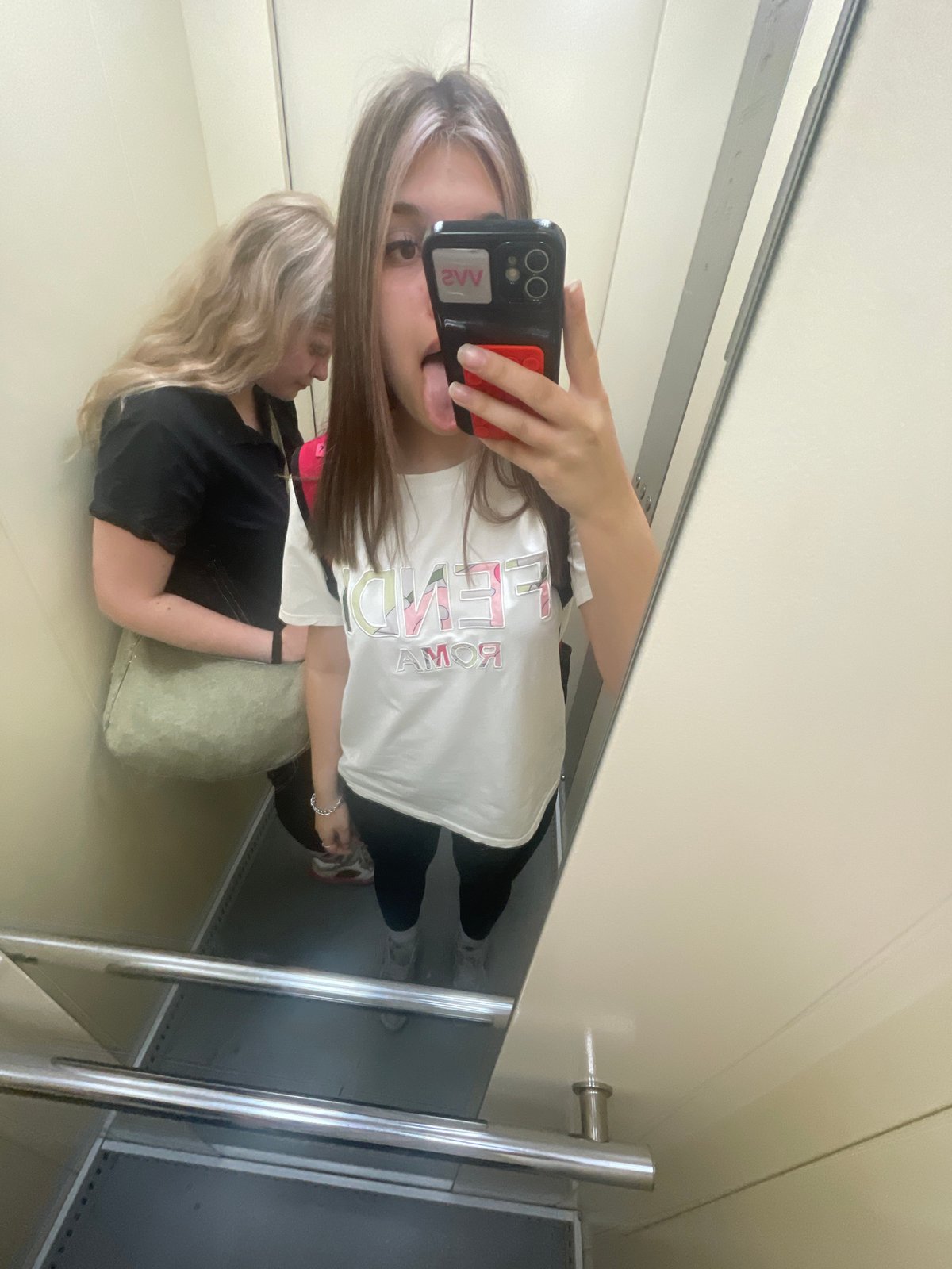 Woman takes selfies, flowers bloom in Sinyavino Russia