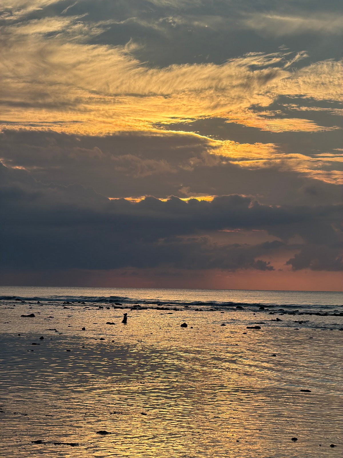 Indonesian beach town Friday morning captured in casual moments