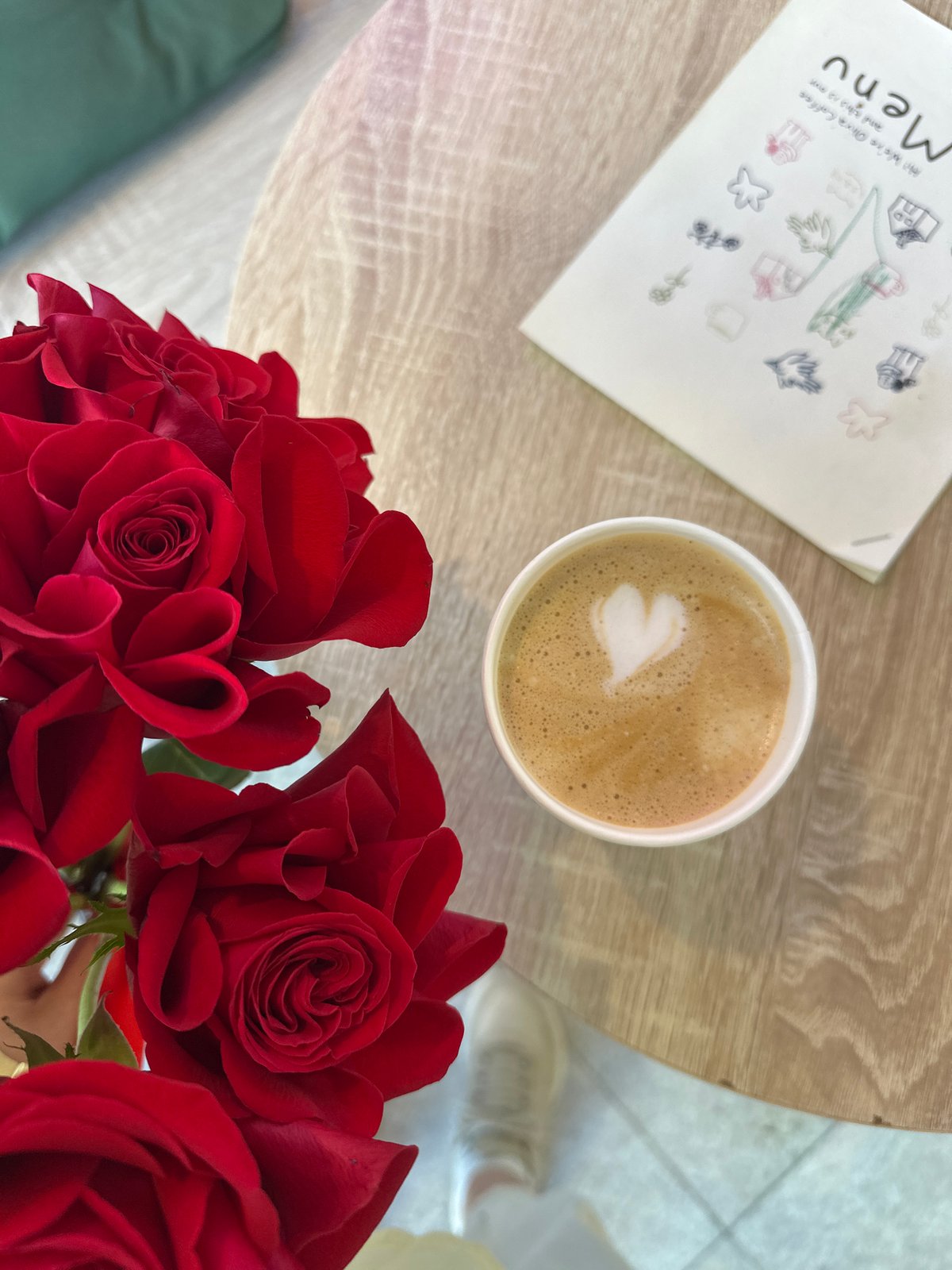 Woman receives red roses at Montenegro coffee shop Sunday morning