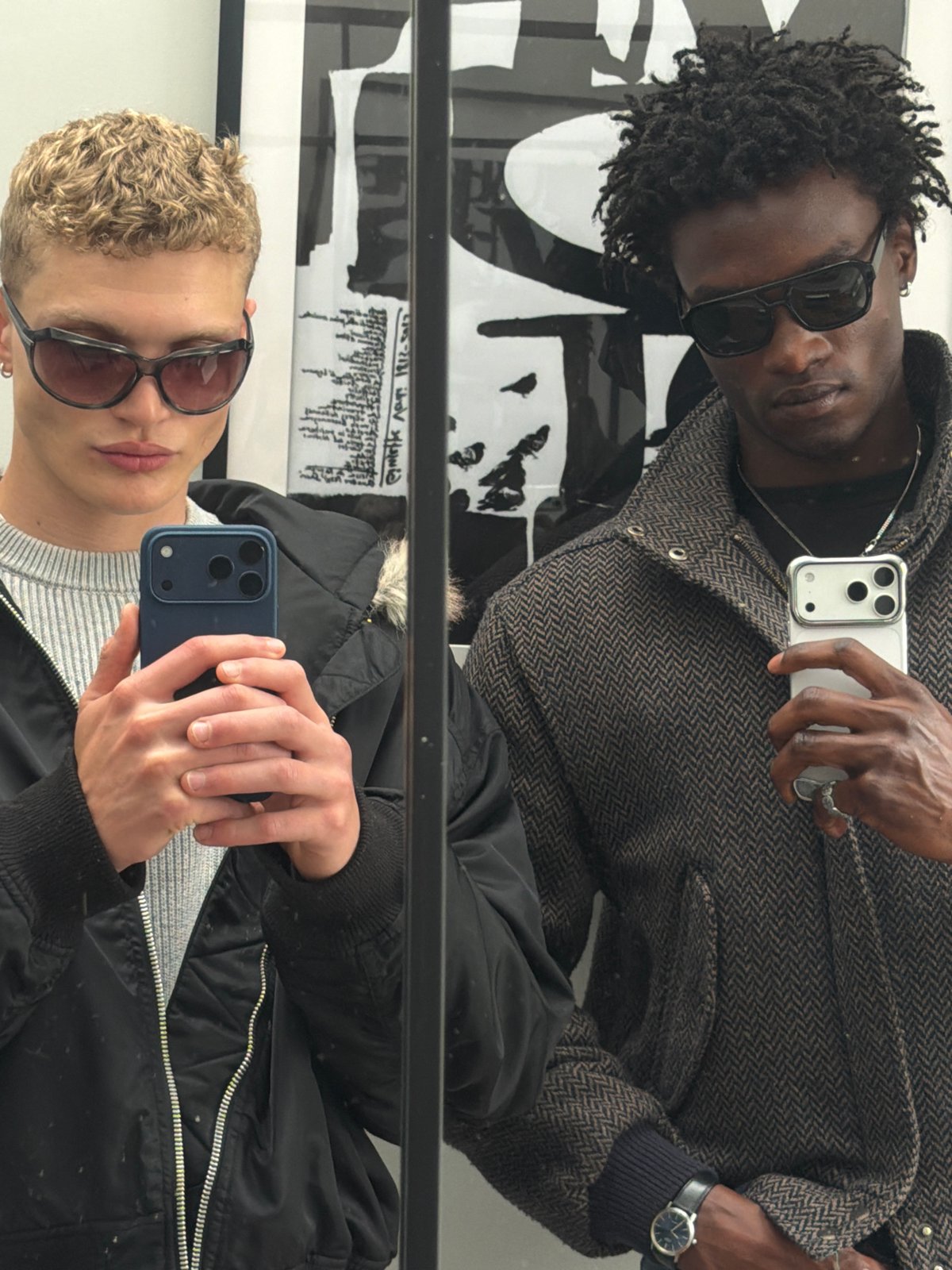 Two men take mirror selfies across London locations