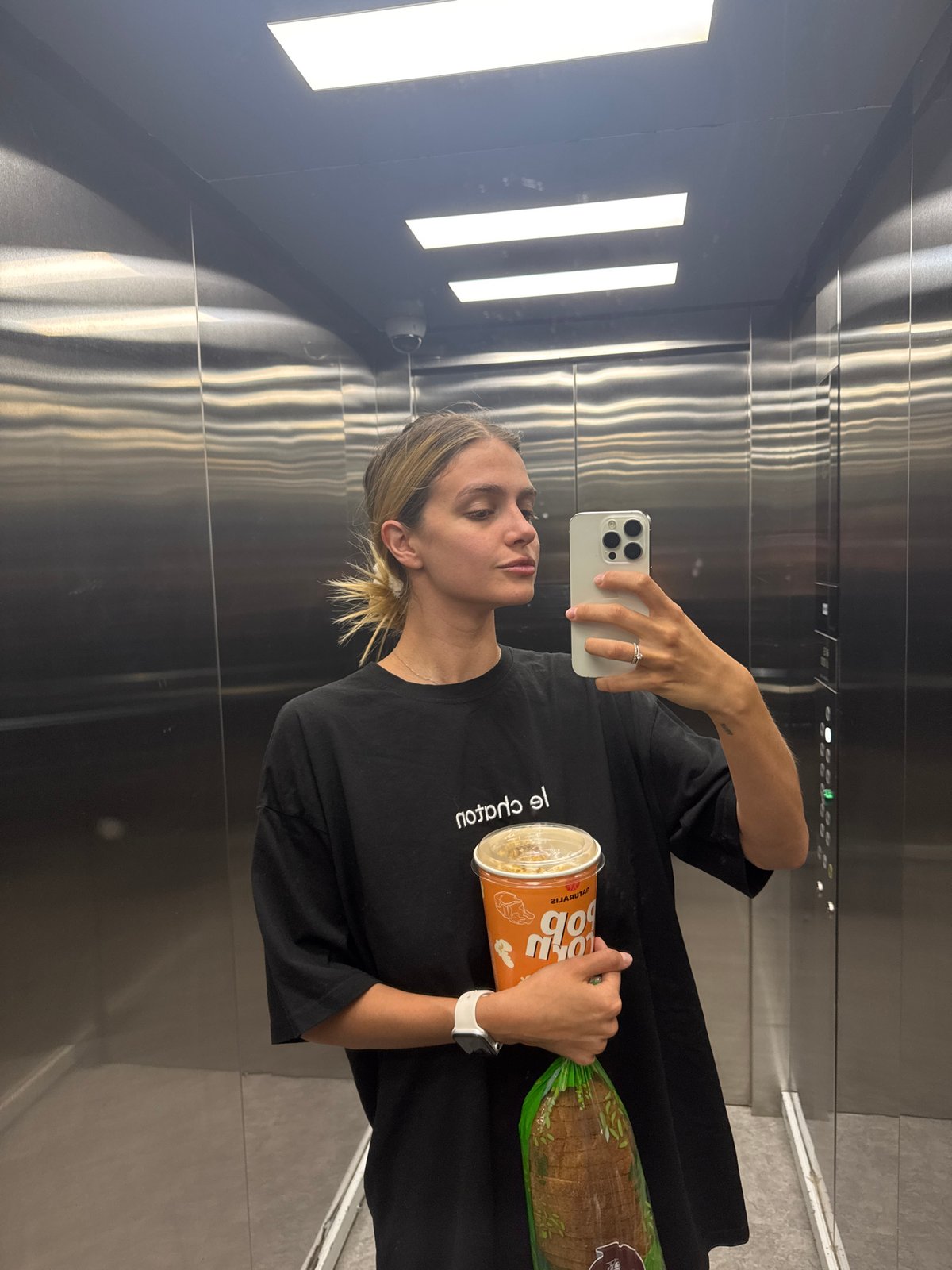 Woman Takes Elevator Selfie; Drawings Found on Ceiling Panel