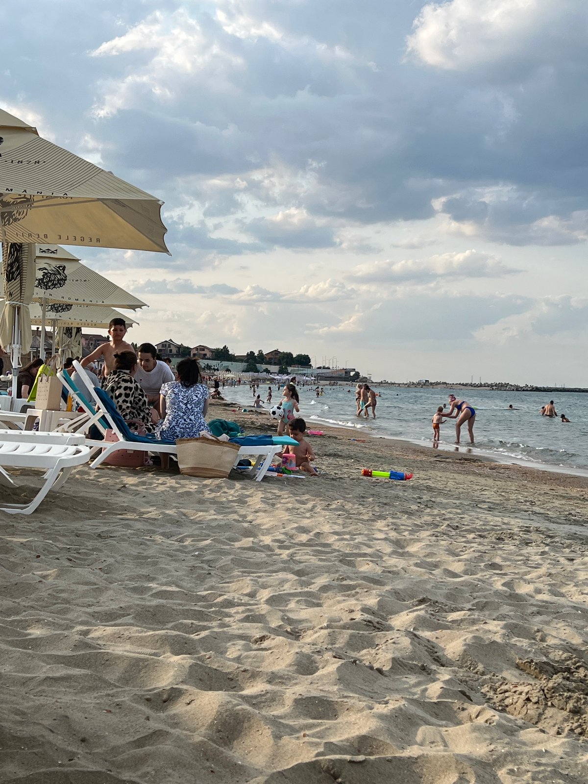 Afternoon at Constanța's Black Sea beach, sun and crowds