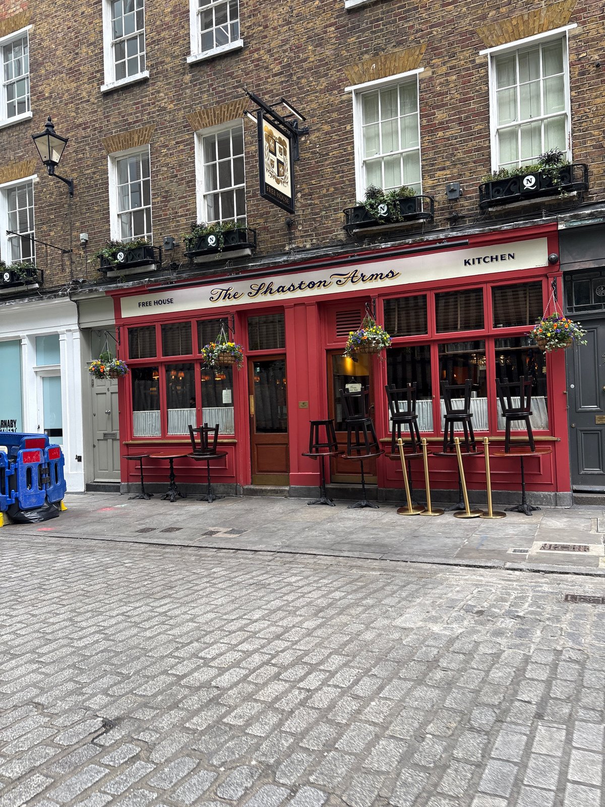 Morning walk past London pub captured on street