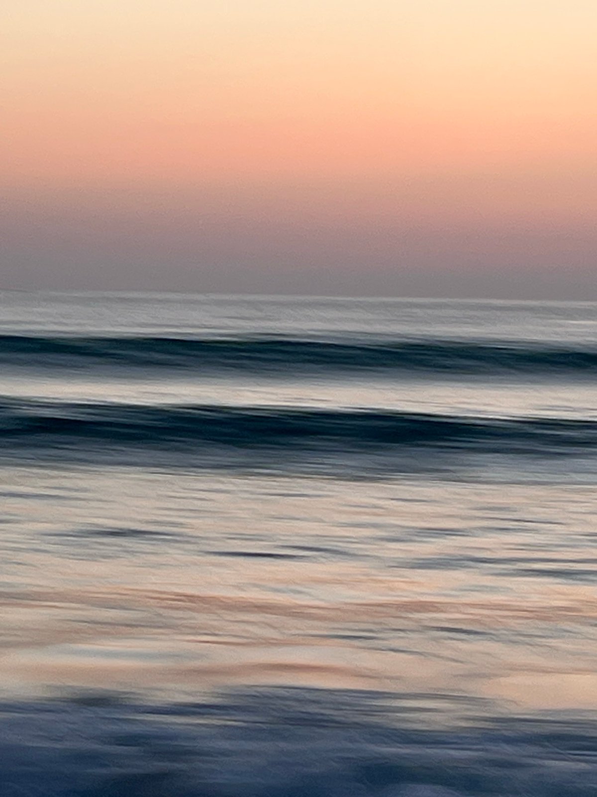 Sunset surfing session documented at A Coruña beach