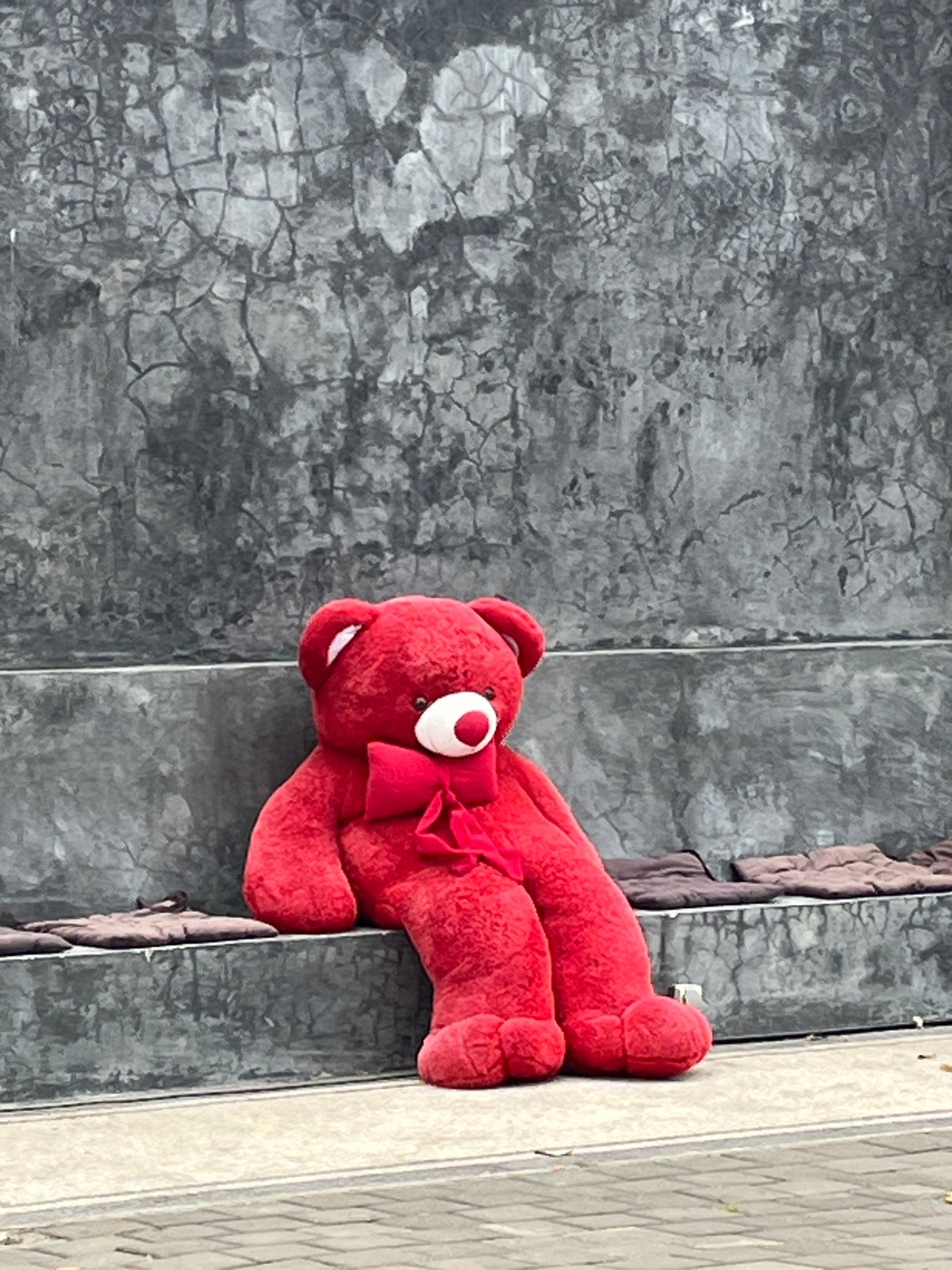 Red teddy bears displayed around North Kuta boutique district