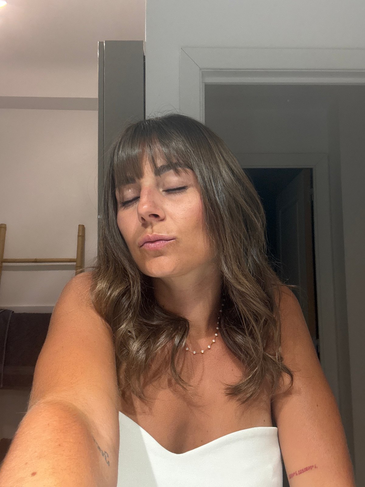 Woman with closed eyes observed in Cannes, France