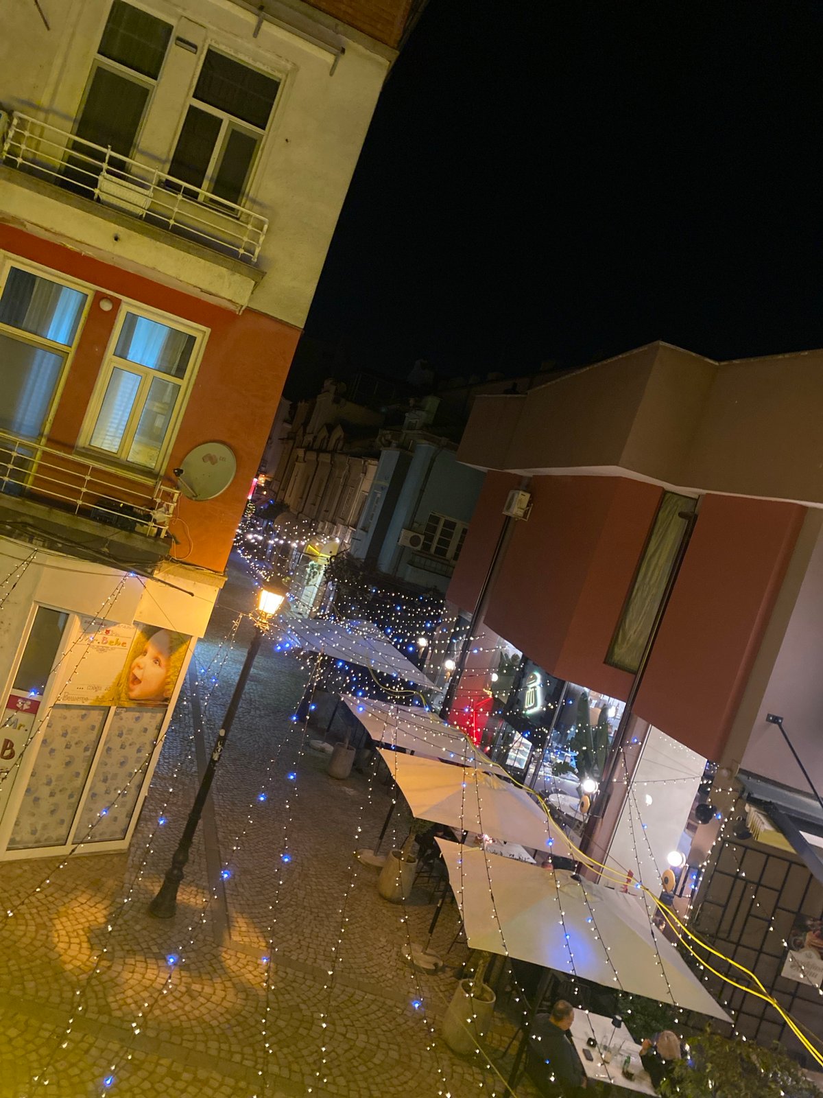 Tilted nighttime street scene captured in Plovdiv, Bulgaria