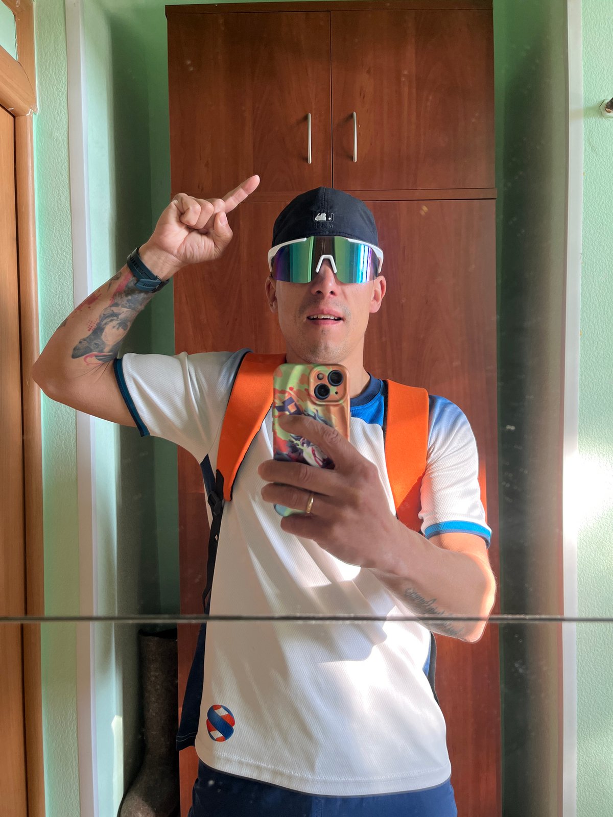 Man takes mirror selfies in multiple outfits in Chaikovsky