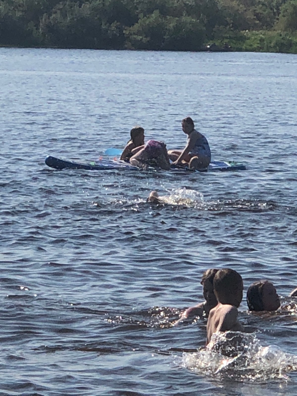 Summer water activities on a river near Solikamsk, Russia