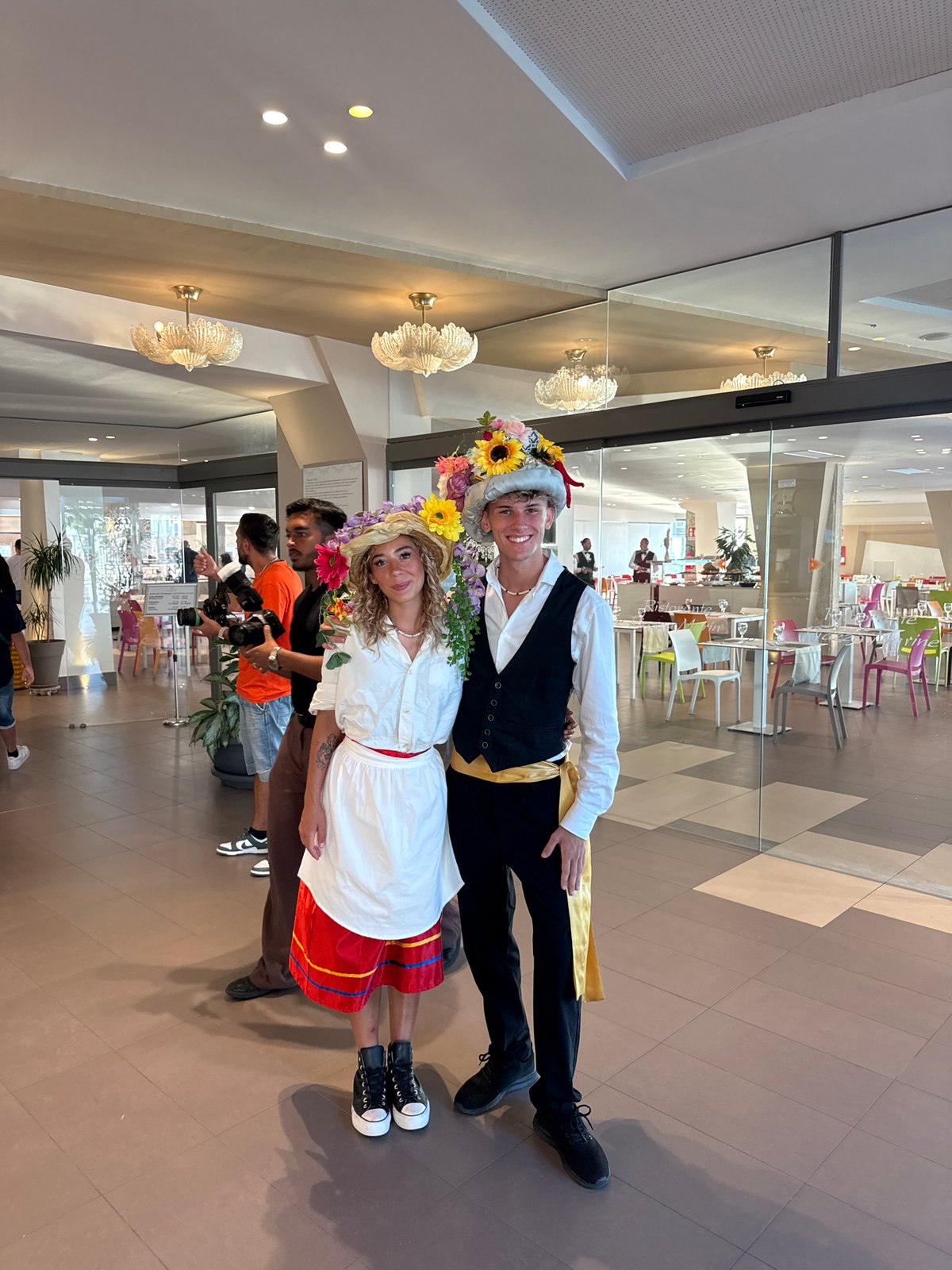 Traditional Sicilian folk dress and local food spread near Palermo