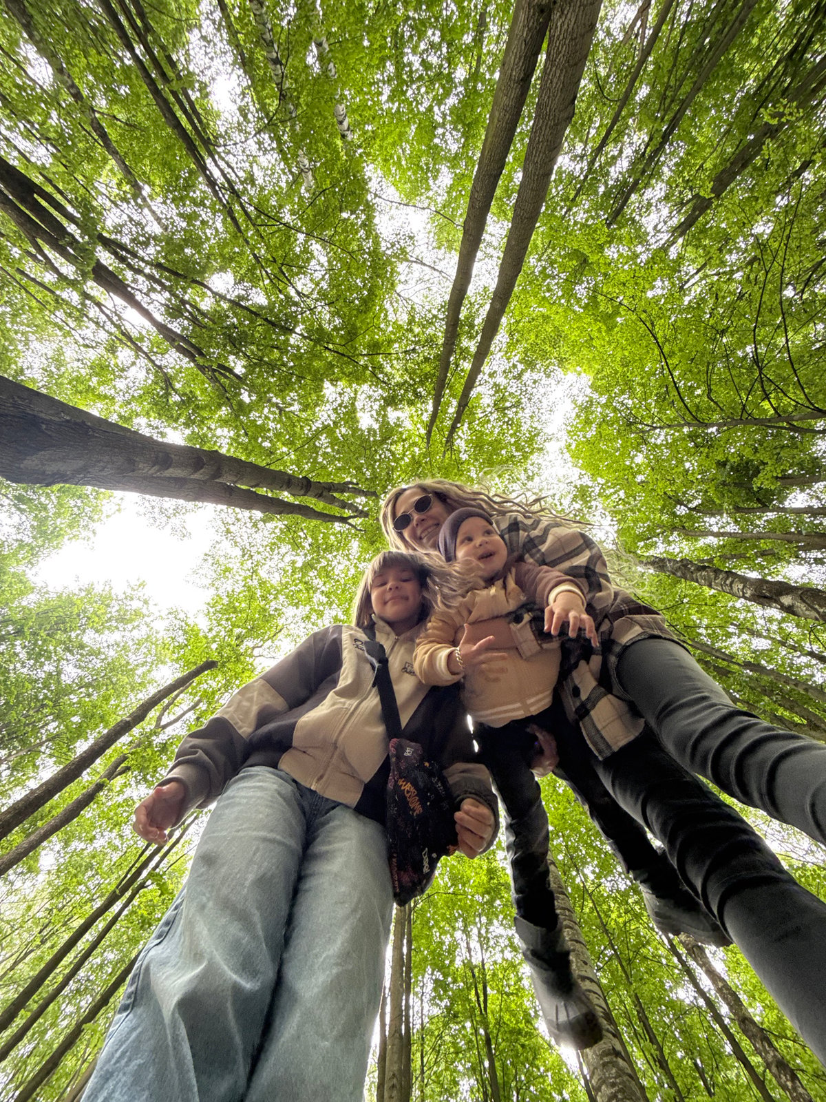 Group photographed in forest during morning outing in Rusanovo