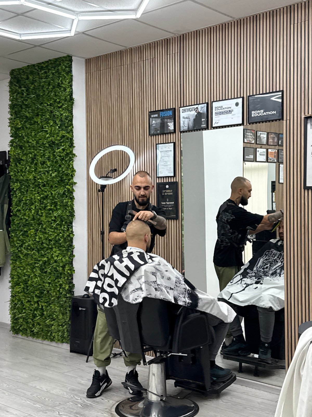 Early morning haircut session captured at Sofia barbershop