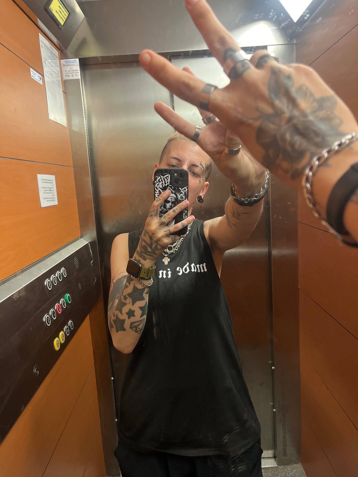 Elevator selfie, wildflower, and a motivational quote from Daugavpils