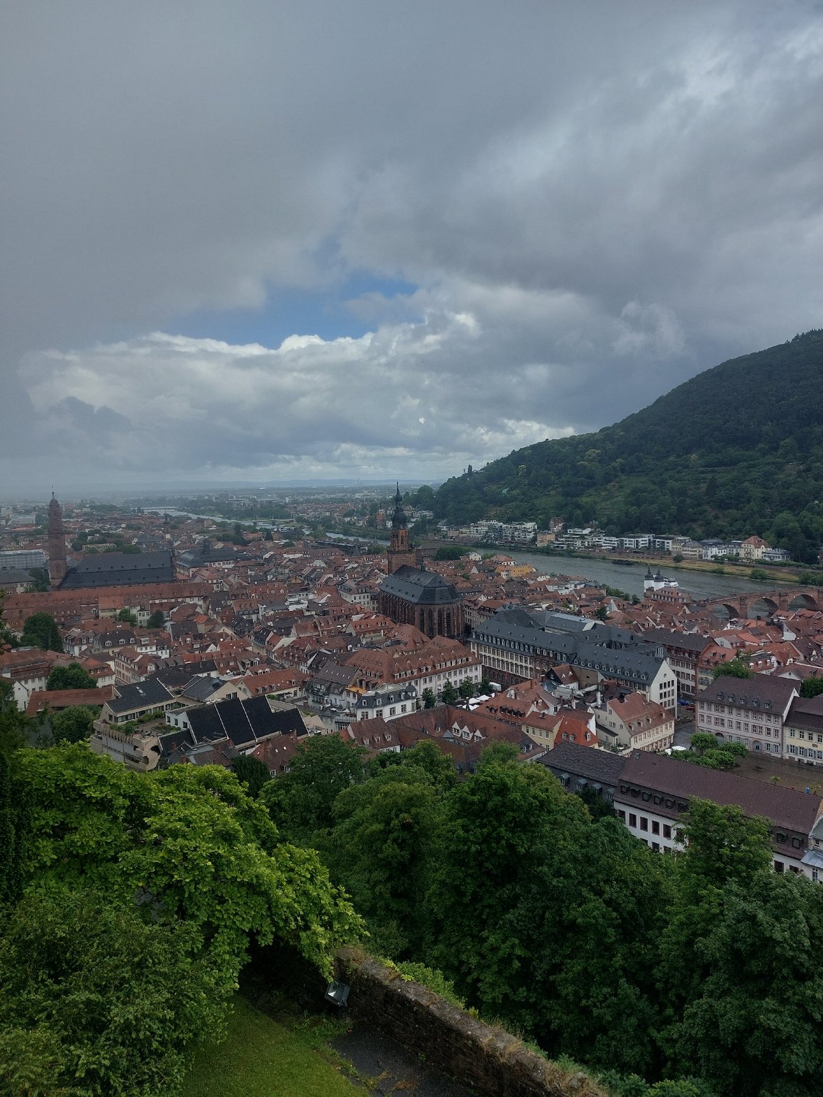 Tourist documents morning visit to historic Heidelberg Castle complex