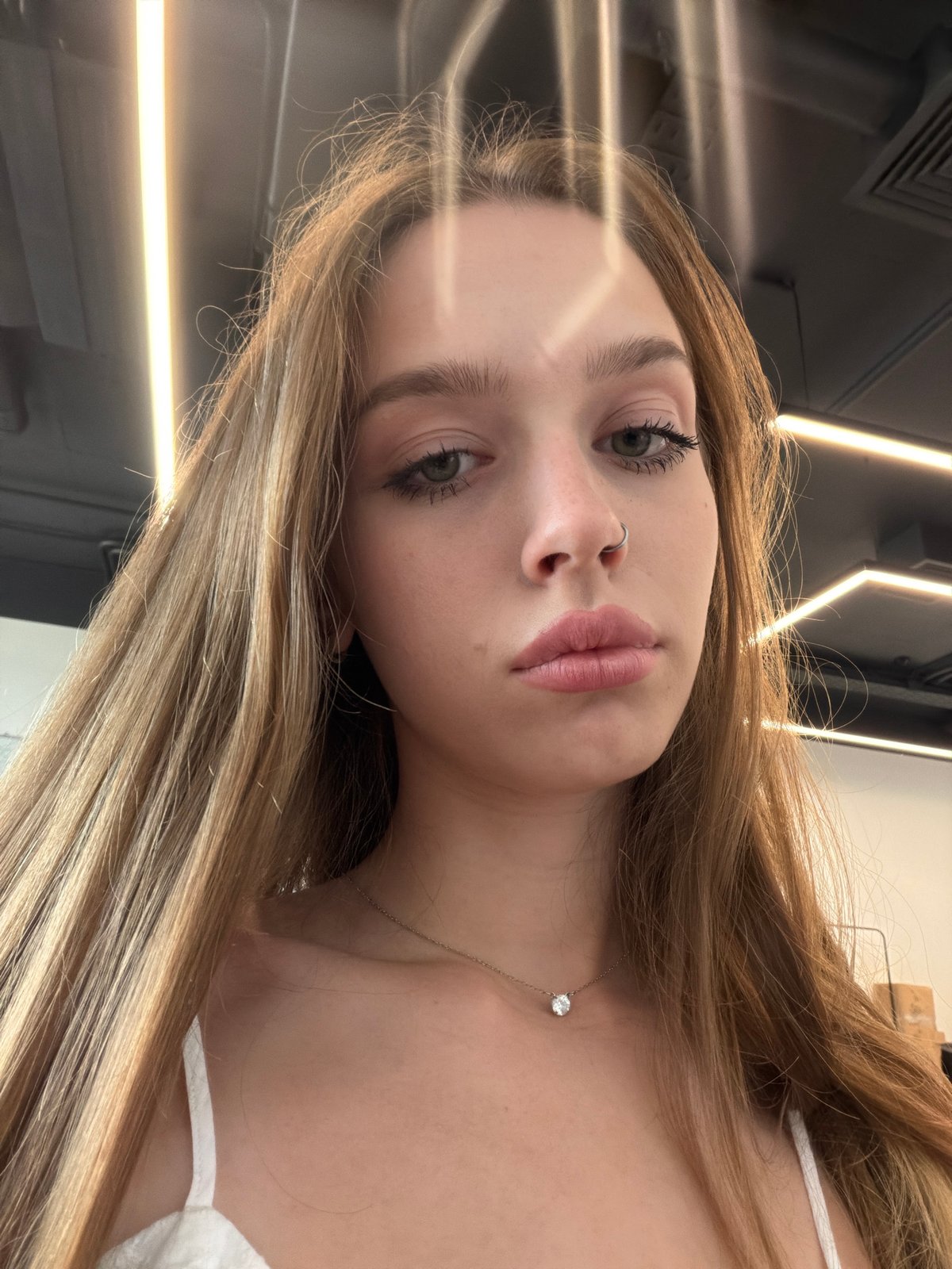 Close-up selfie series, varied angles, consistent look