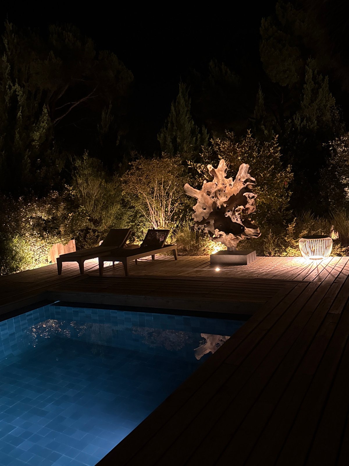 Illuminated backyard pool at night, Grândola, Portugal