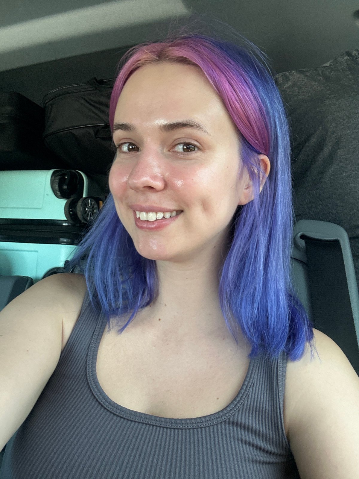 Woman takes travel selfie in vehicle in Slovenia