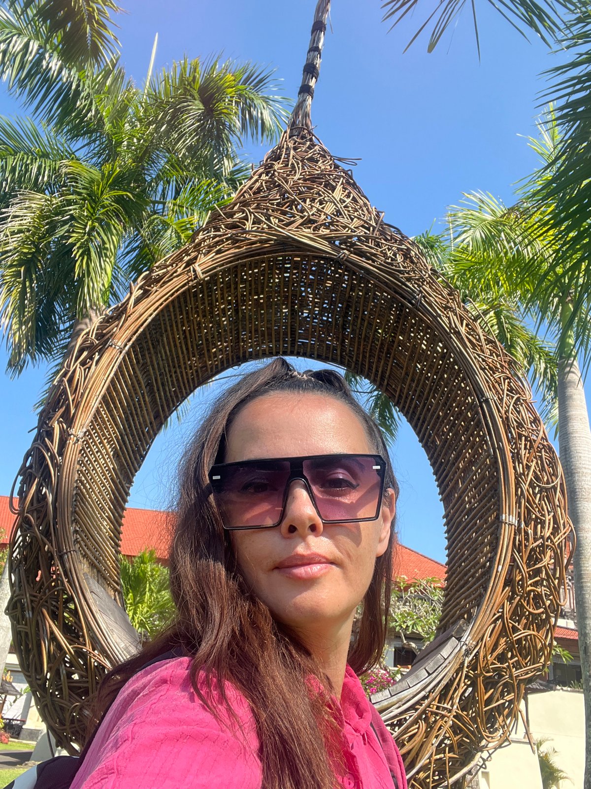 Selfies at woven nest swing in Kuta Selatan