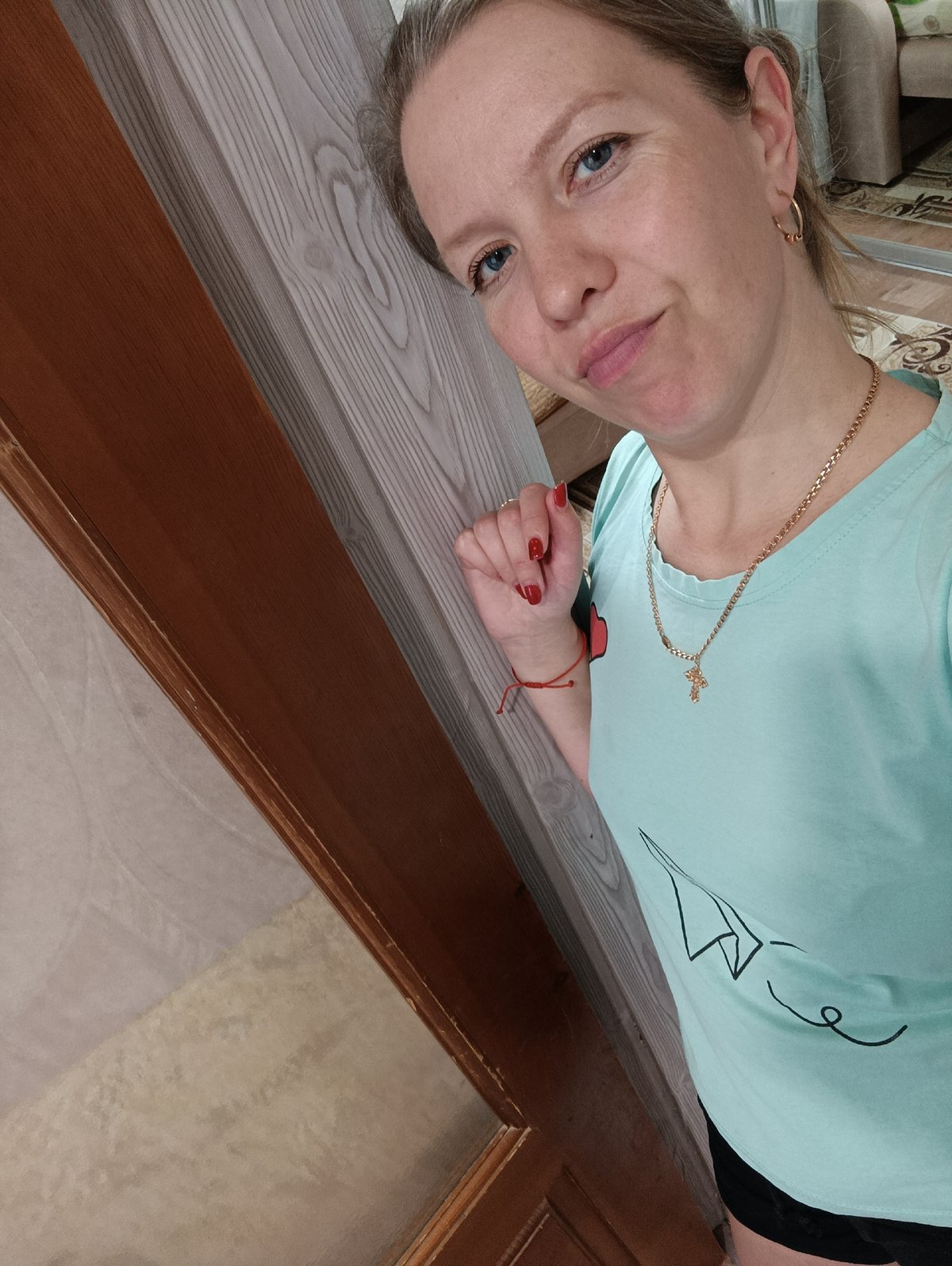 Woman takes indoor selfies in Chaikovsky, Russia