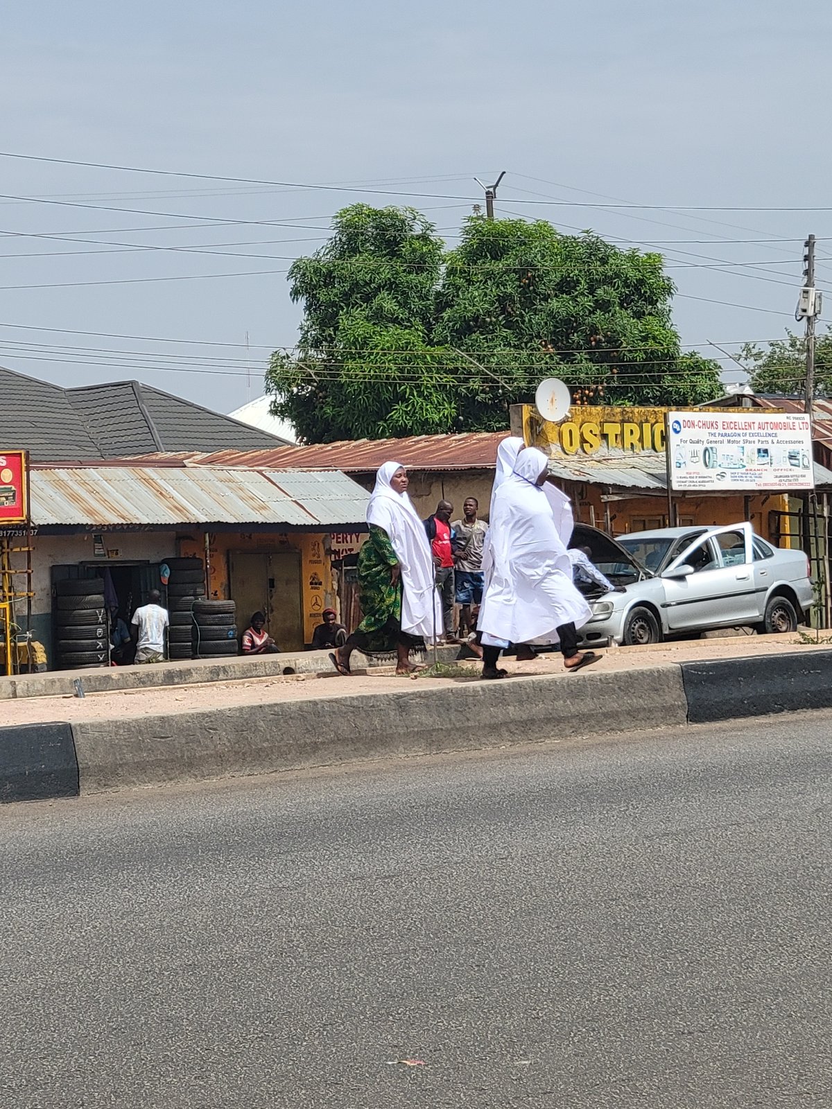 Morning street life documented across Jos, Nigeria neighborhoods
